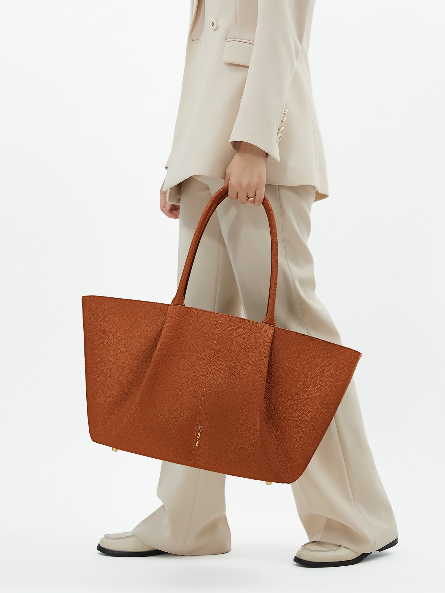 Victoria Hyde Ada laptop handbag in brown, vegan leather business tote with 16-inch laptop compartment and trolley sleeve
