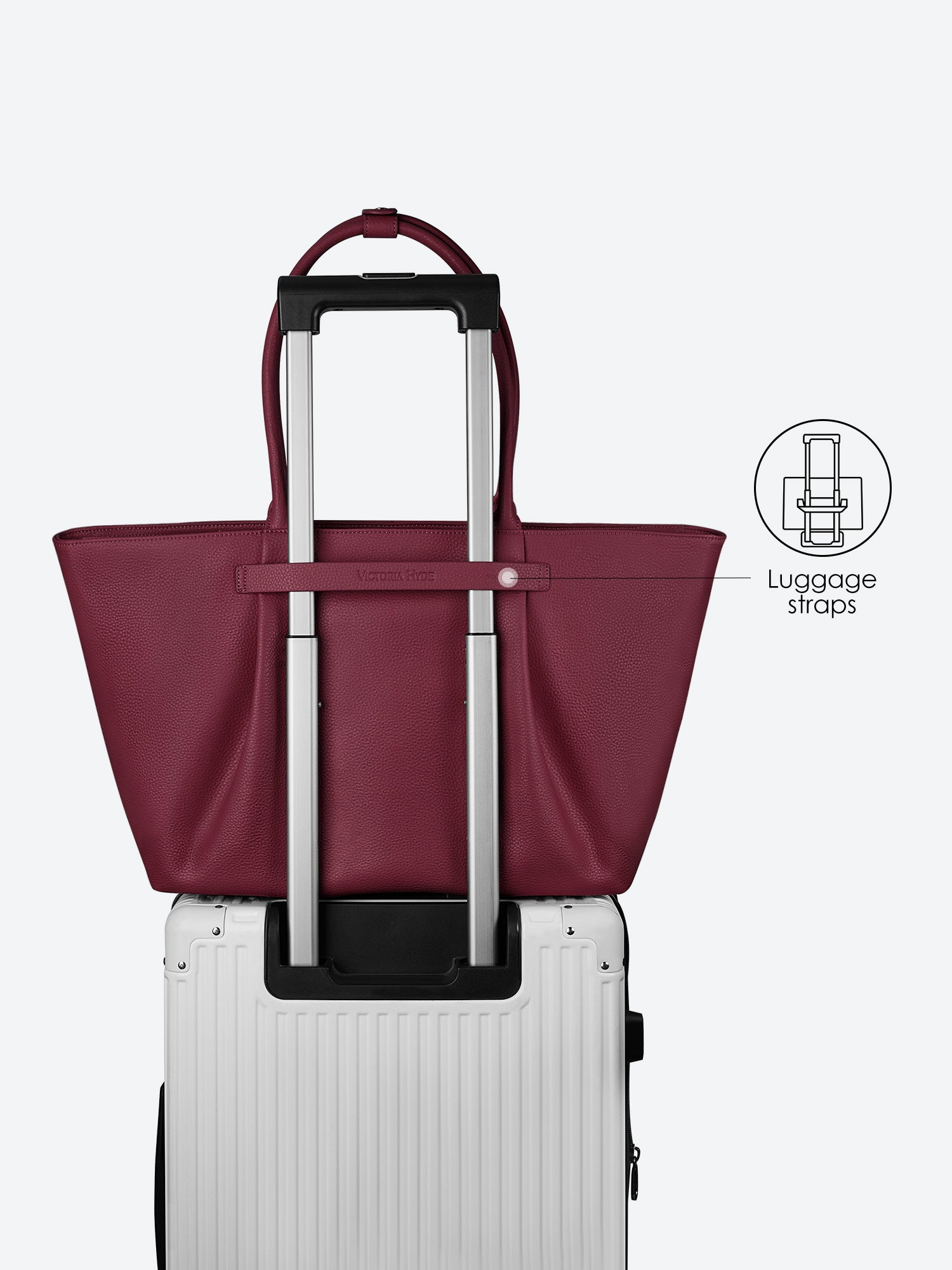 Victoria Hyde Ada red laptop bag with luggage strap, easily attaches to trolley handles for convenient travel, stylish business bag for commuters.