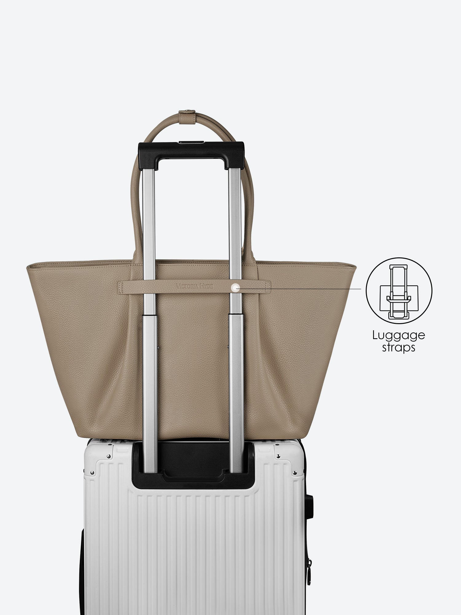 Victoria Hyde Ada beige laptop bag with luggage strap, easily attaches to trolley handles for convenient travel, stylish business bag for commuters.