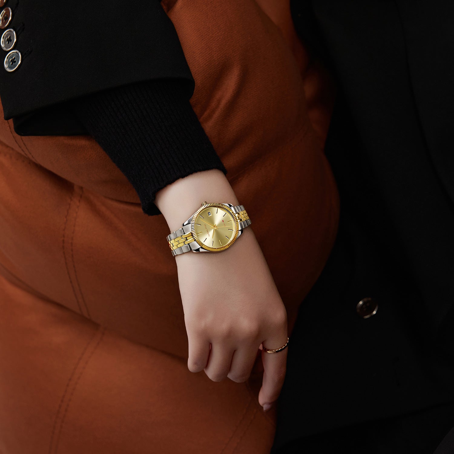 Victoria Hyde gold-silver watch with gold sunburst dial, calendar, stainless steel band, double butterfly clasp, 32mm case, 3-year battery.