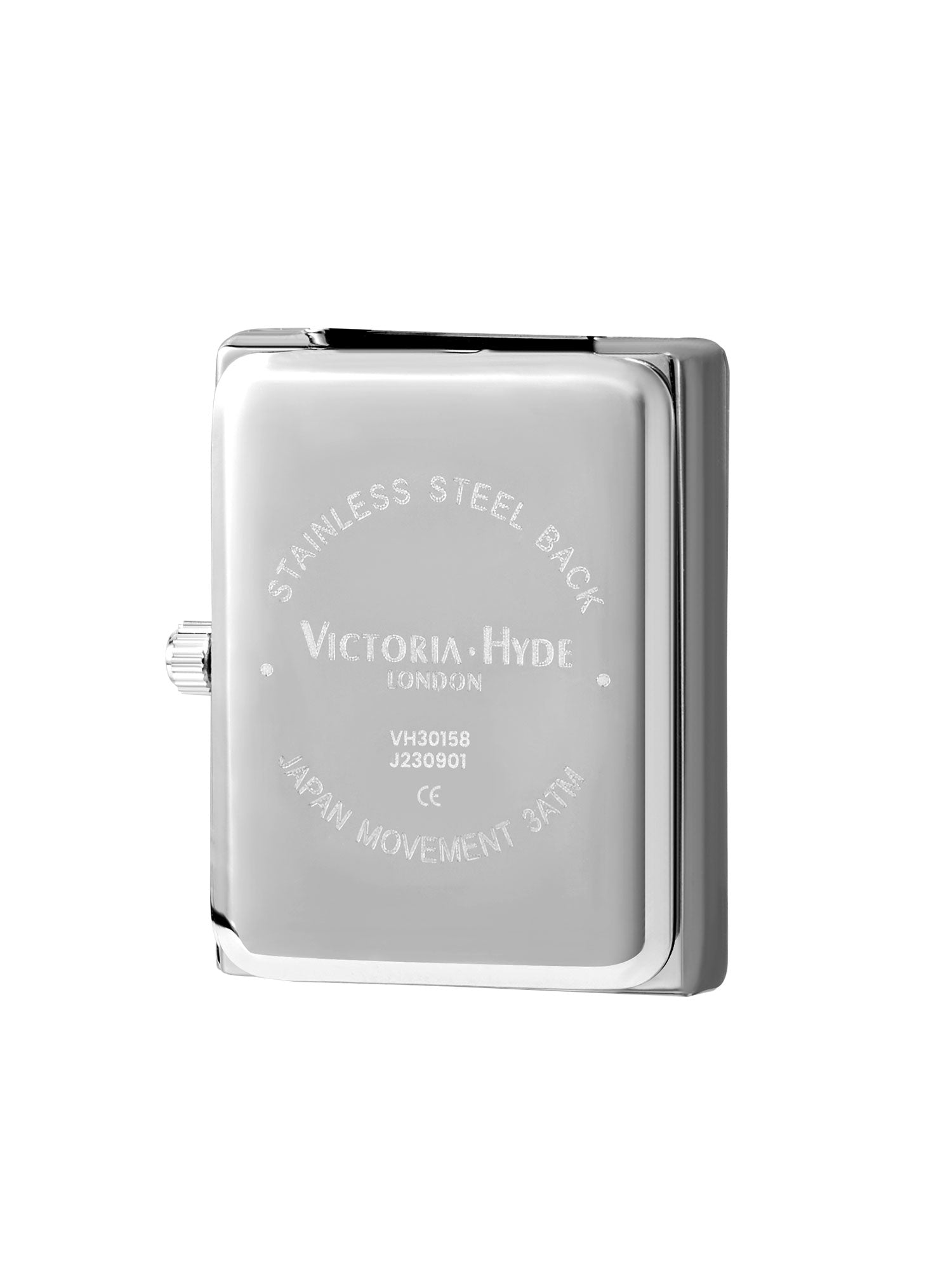 Victoria Hyde nude bag charm with watch and chain. Minimalist design with logo and flag symbol. Timeless accessory, 185mm chain length. Elegant functionality.