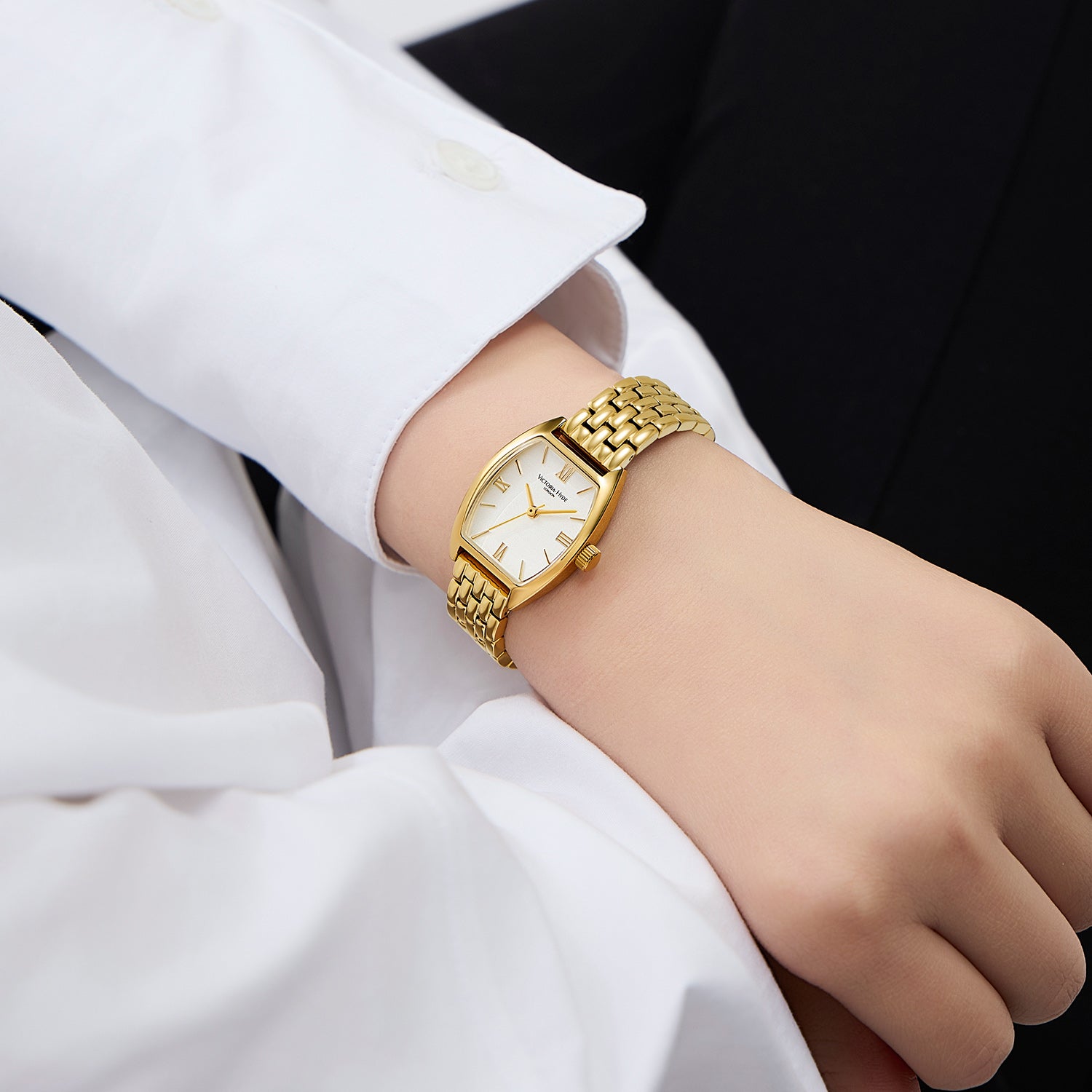 Elegant Victoria Hyde London ladies' watch, BARREL series. Light gold tonneau case, silver sand-dial, quartz movement, 3ATM water resistance.