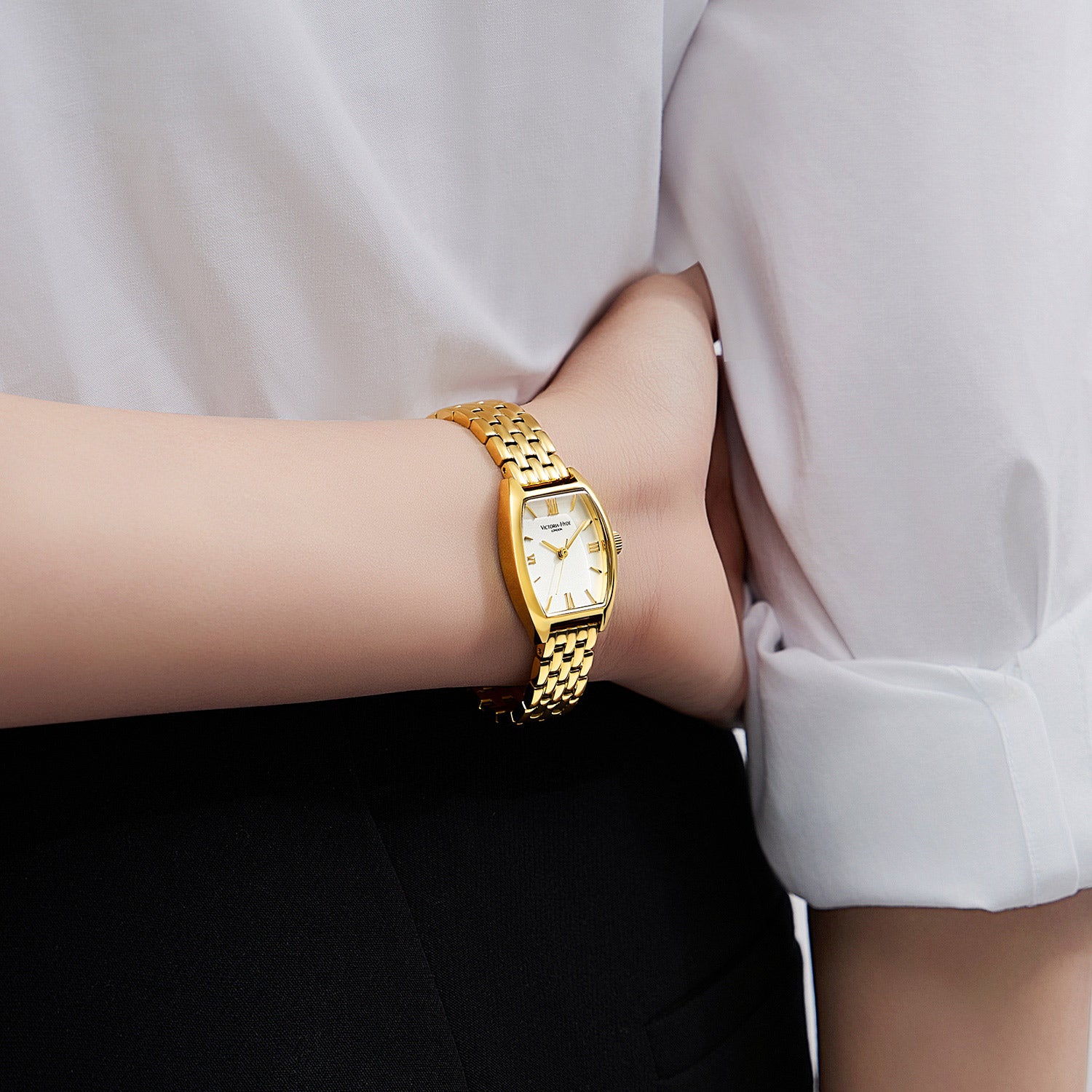Elegant Victoria Hyde London ladies' watch, BARREL series. Light gold tonneau case, silver sand-dial, quartz movement, 3ATM water resistance.