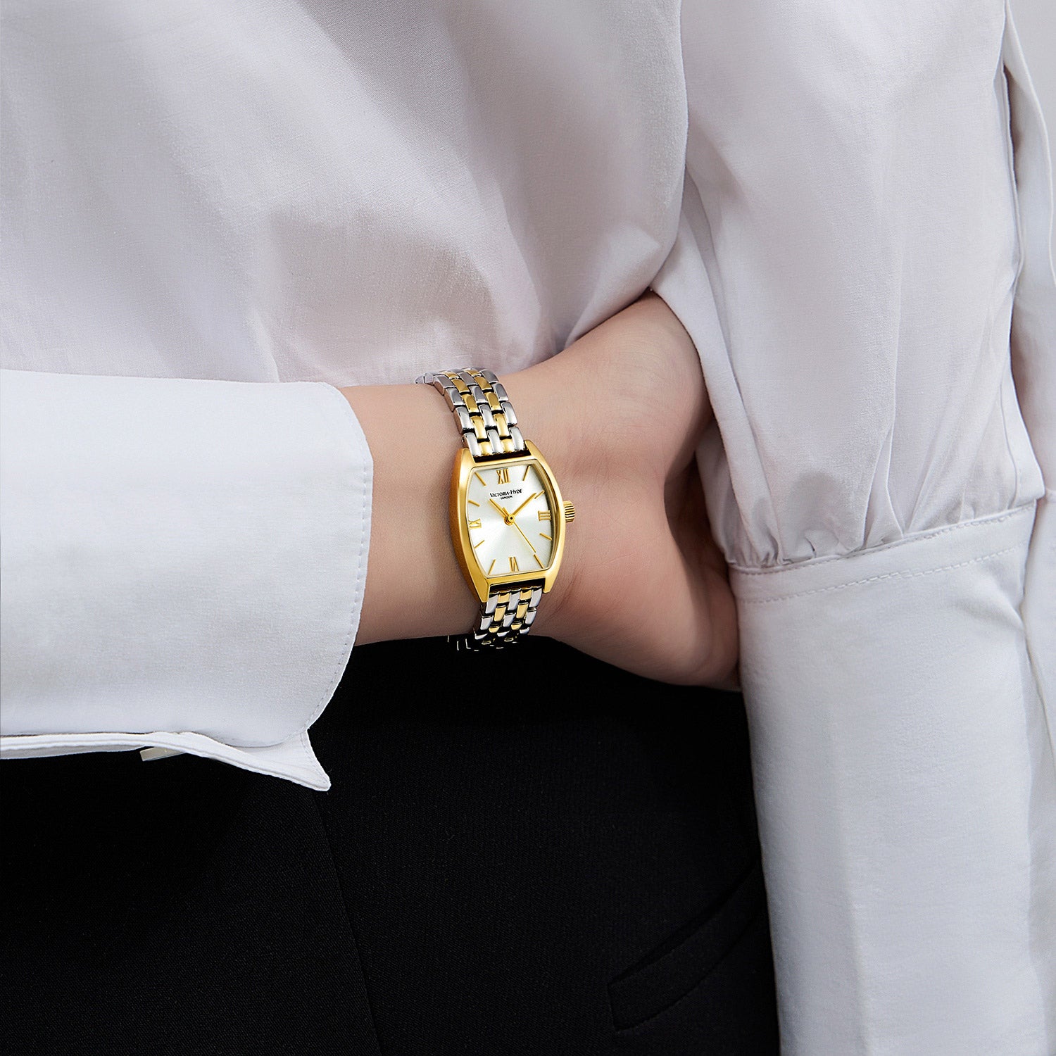 Victoria Hyde London BARREL women's watch, silver-gold tonneau copper case, sunburst dial, stainless steel bracelet with light gold accents, quartz movement.