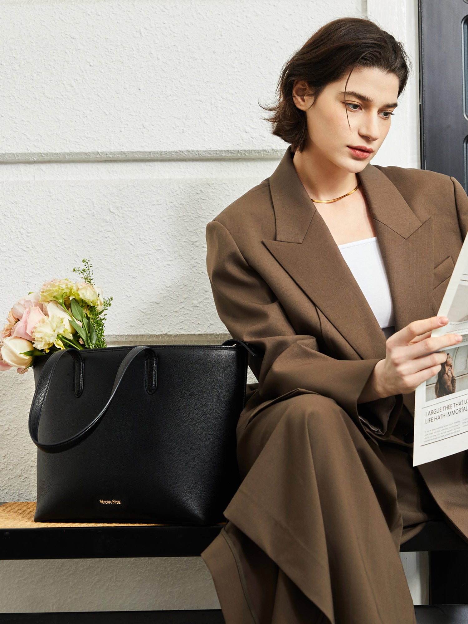 Black Yoana Large work bag by Victoria Hyde. Vegan microfiber leather, Shandong silk lining, padded 15" laptop compartment, removable cosmetic bag, water-repellent. Ideal for commuters.