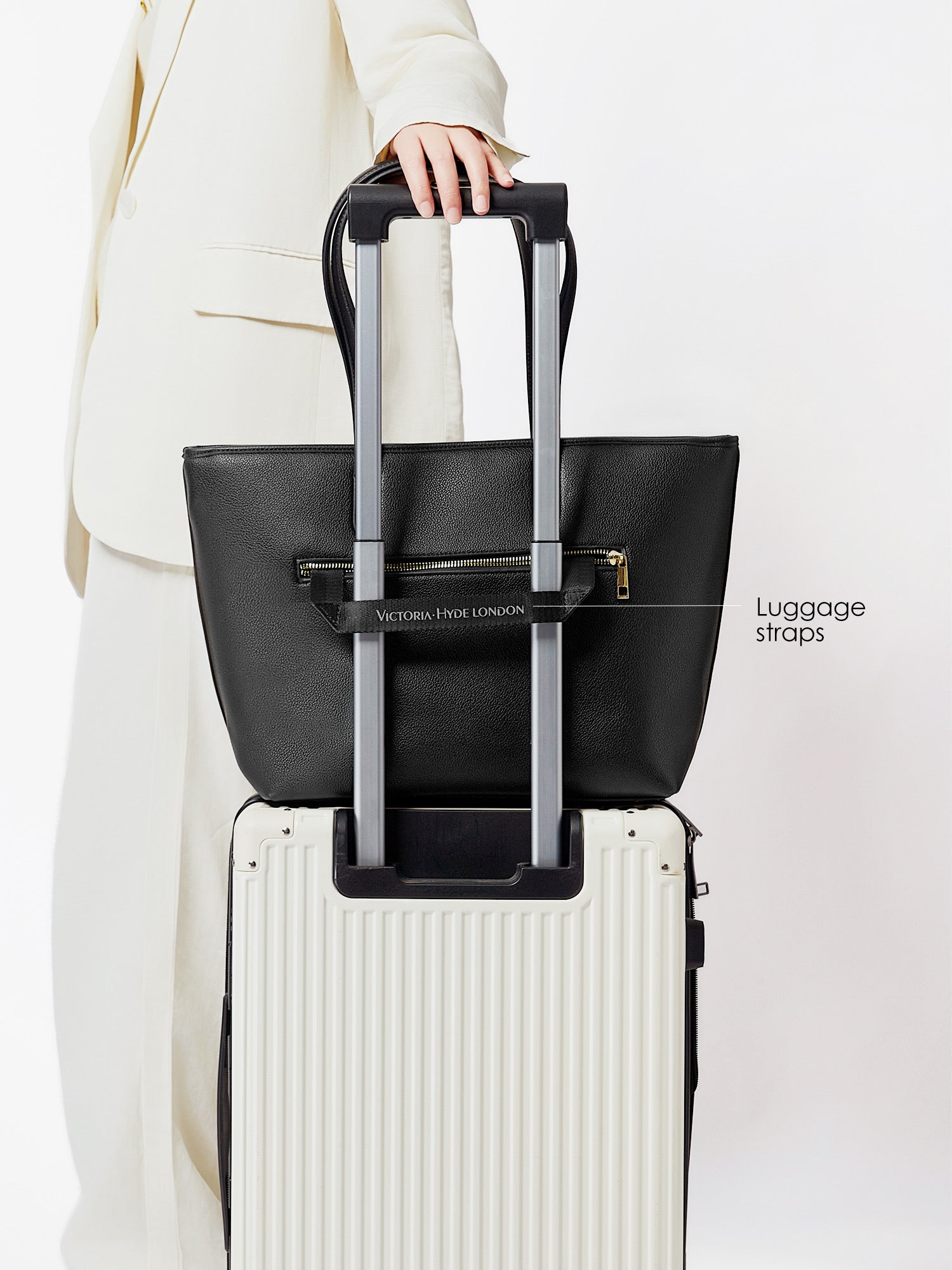 Black Yoana Large work bag by Victoria Hyde. Vegan microfiber leather, Shandong silk lining, padded 15" laptop compartment, removable cosmetic bag, water-repellent. Ideal for commuters.