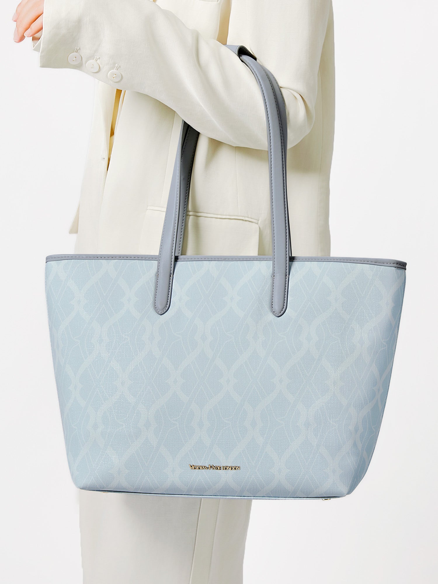 Victoria Hyde Yoana Large work bag in light blue, vegan, water-repellent, with laptop compartment and removable cosmetic bag.