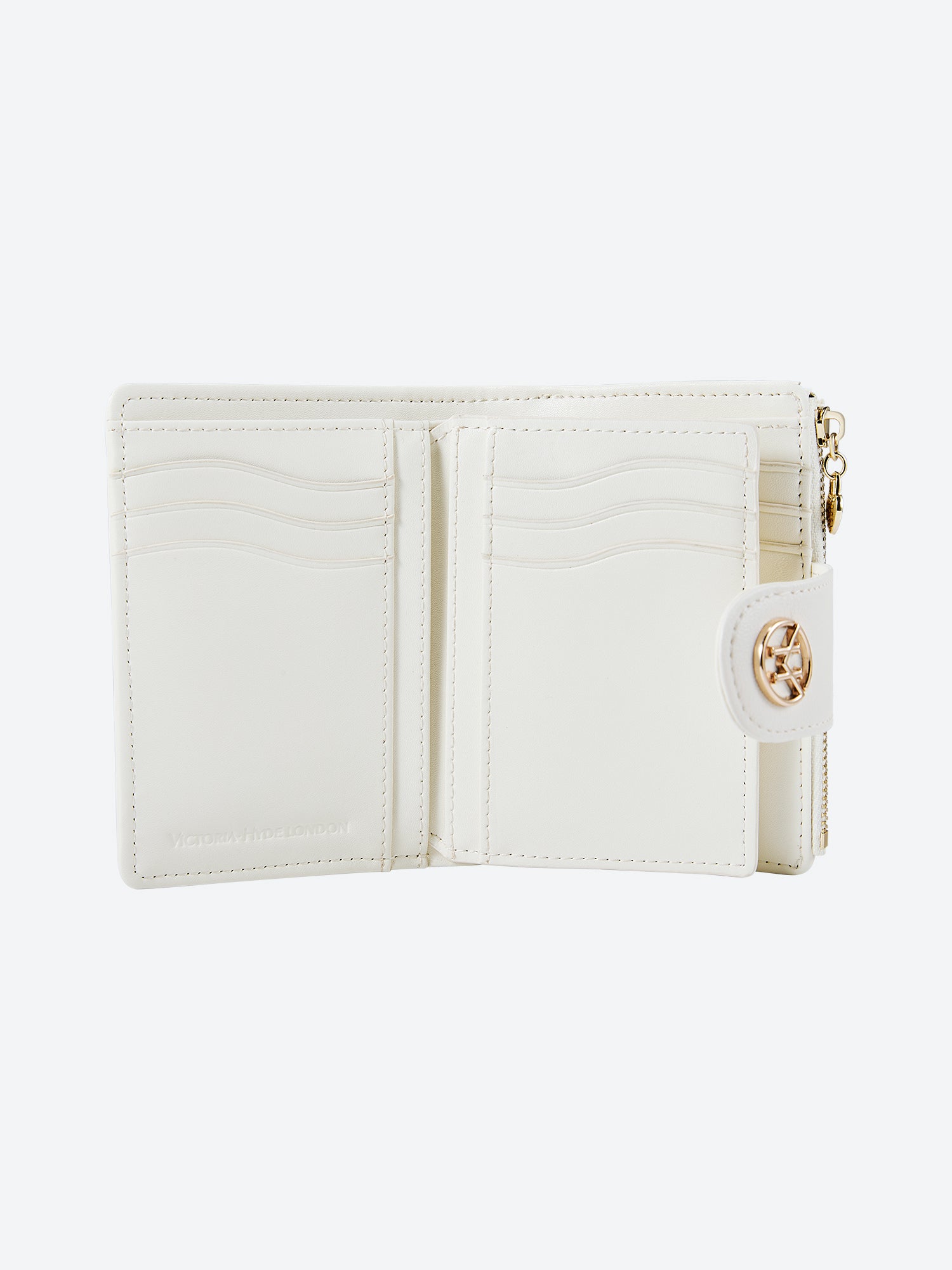 Victoria Hyde Rosi milk-white genuine leather wallet with 23 card slots, bill compartment, and zippered coin pocket. Multifunctional and elegant.