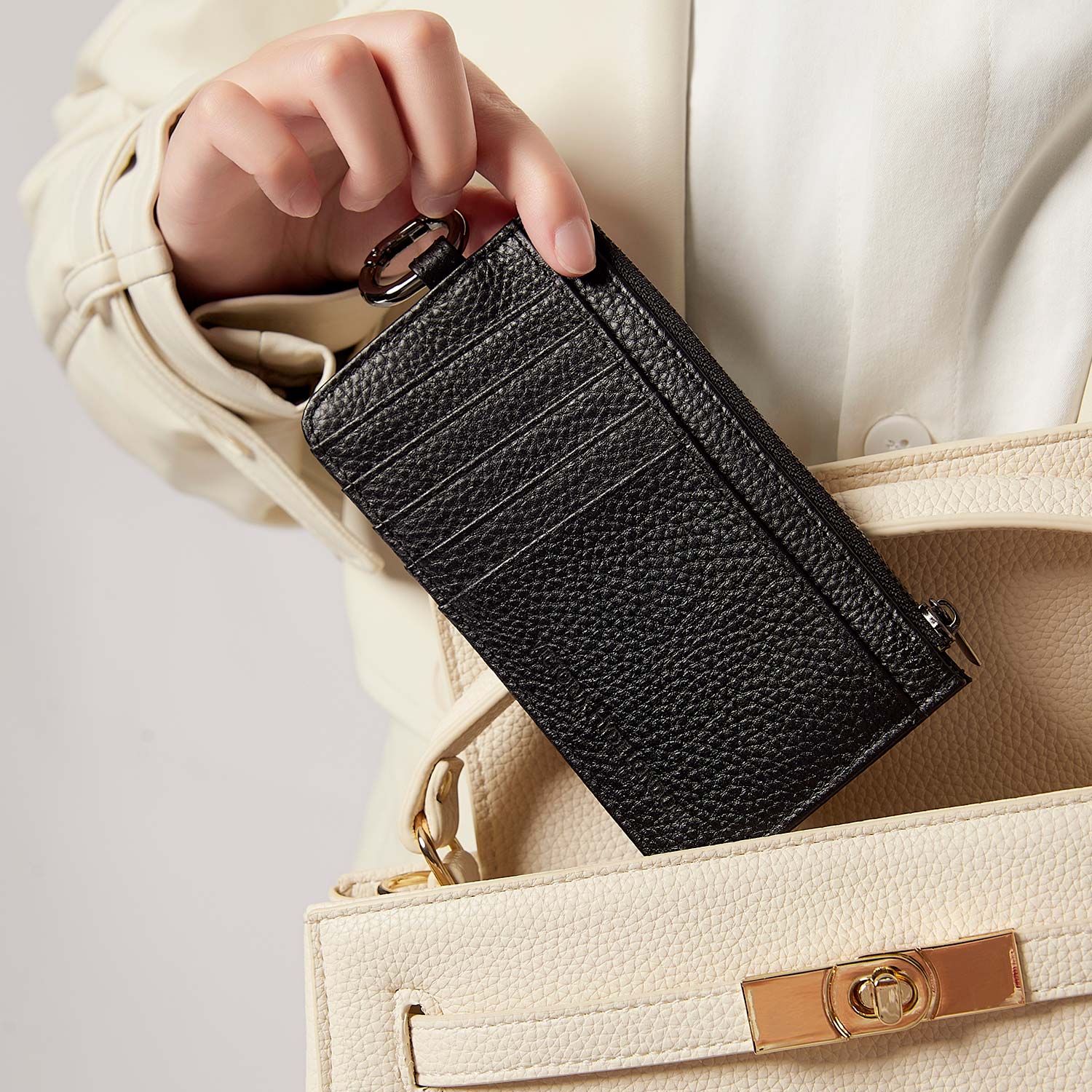 Victoria Hyde black genuine leather cardholder, unisex, multi-functional. Features 10 card slots, coin pocket, ticket slot, removable clasp. Minimalist and practical.