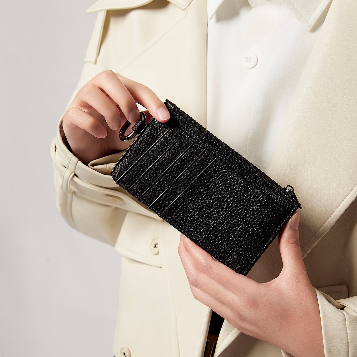 Victoria Hyde black genuine leather cardholder, unisex, multi-functional. Features 10 card slots, coin pocket, ticket slot, removable clasp. Minimalist and practical.