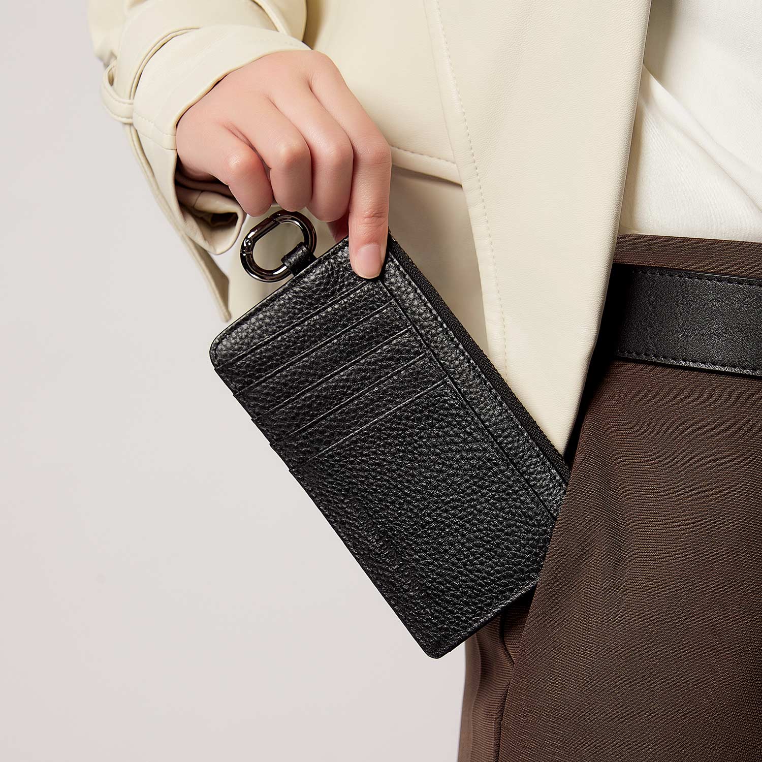 Victoria Hyde black genuine leather cardholder, unisex, multi-functional. Features 10 card slots, coin pocket, ticket slot, removable clasp. Minimalist and practical.