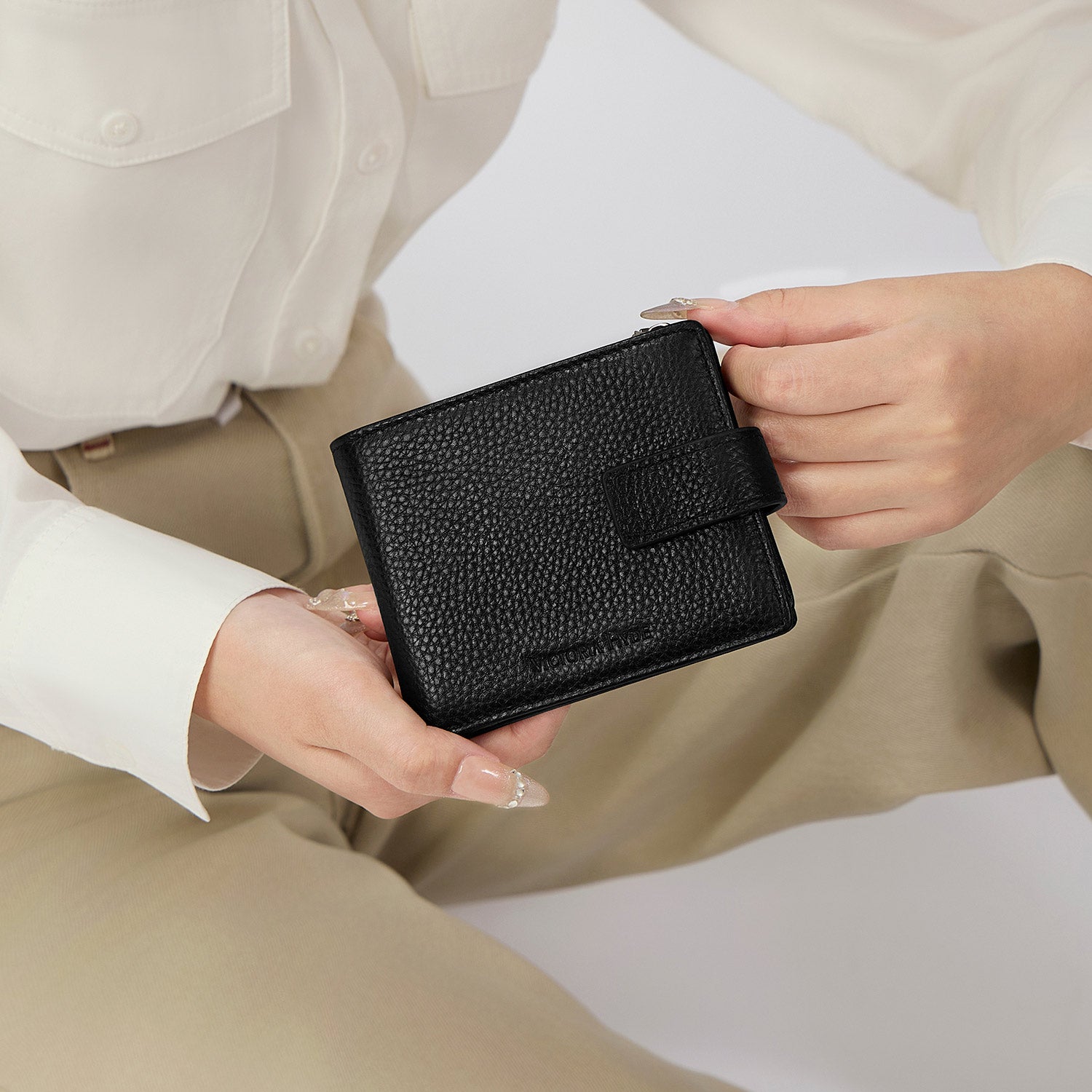 Victoria Hyde genuine leather unisex wallet – multifunctional with 8 card slots, bill clip, removable coin pouch, metal fastener, slim and minimalist design.