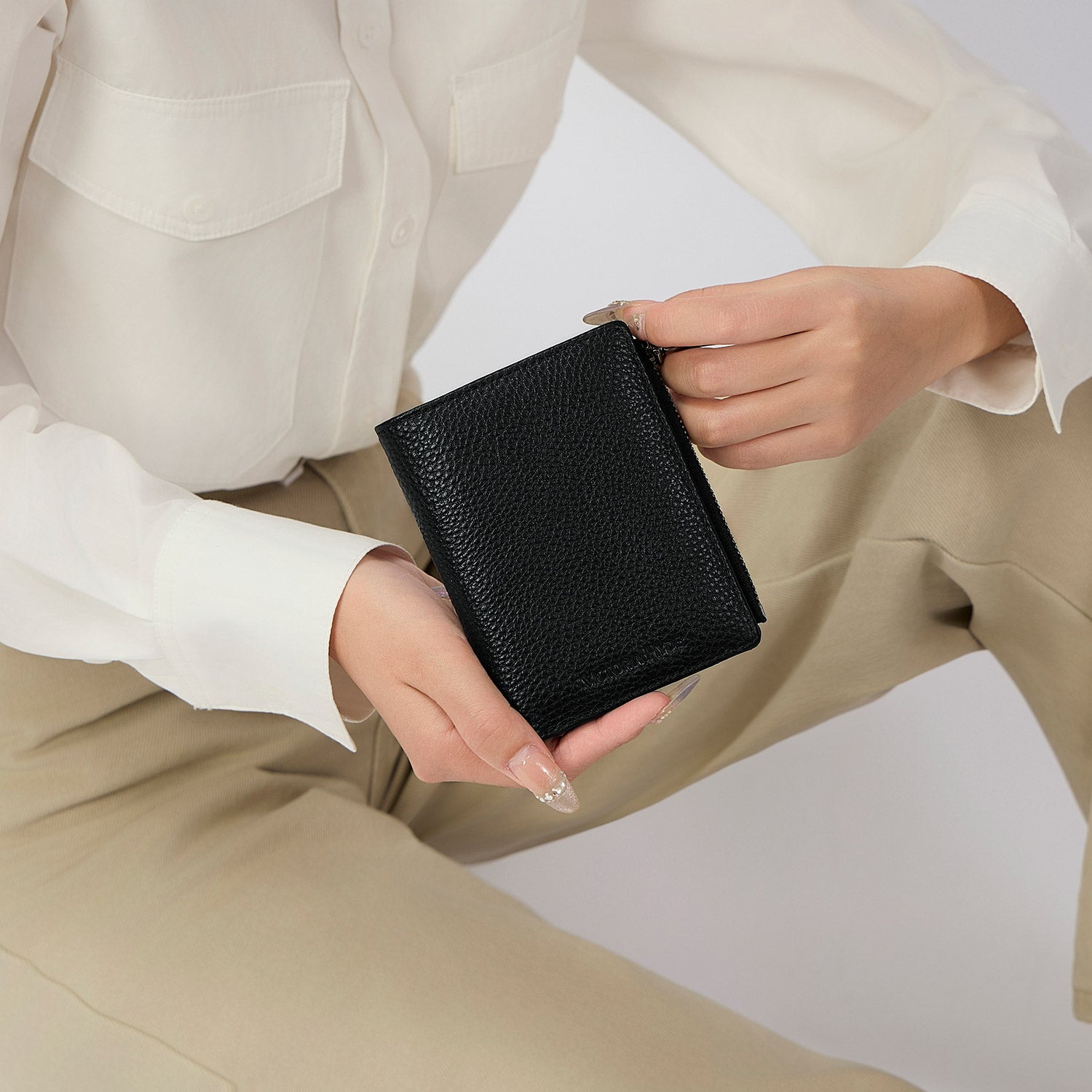 Victoria Hyde genuine leather men's wallet with 8 card slots, bill compartment, zipper coin pocket, plus 4 external quick-access slots. Durable, minimalist luxury for everyday use.