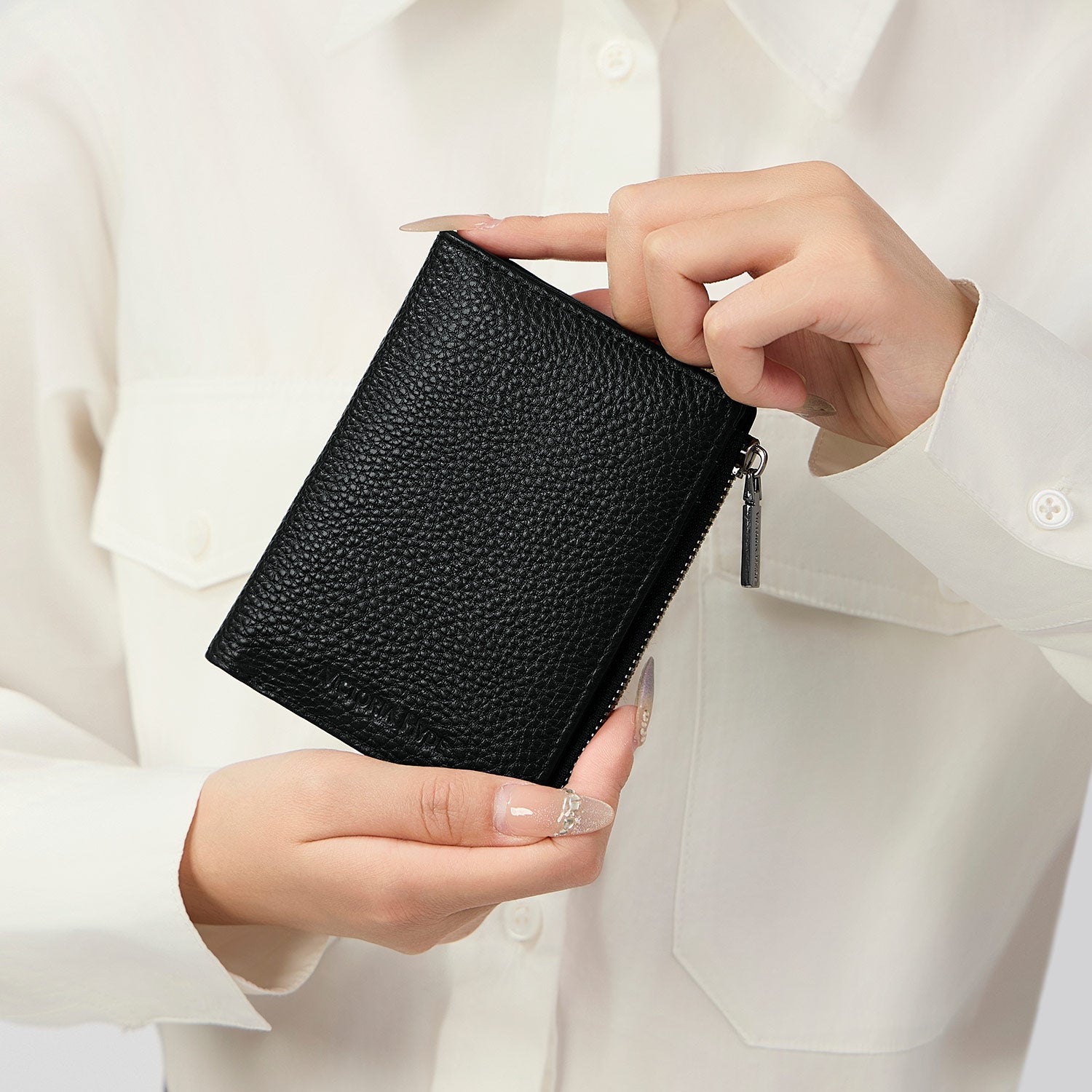 Victoria Hyde genuine leather men's wallet with 8 card slots, bill compartment, zipper coin pocket, plus 4 external quick-access slots. Durable, minimalist luxury for everyday use.