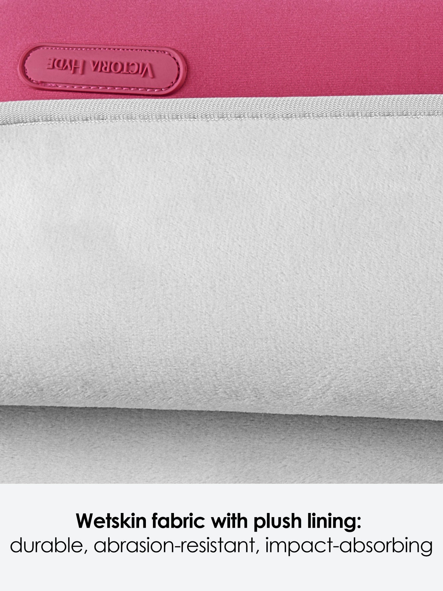 Victoria Hyde pink neoprene laptop sleeve for 13-inch laptops, 32.5x25x1.5cm, lightweight 0.2kg, zinc alloy hardware, protective and durable.