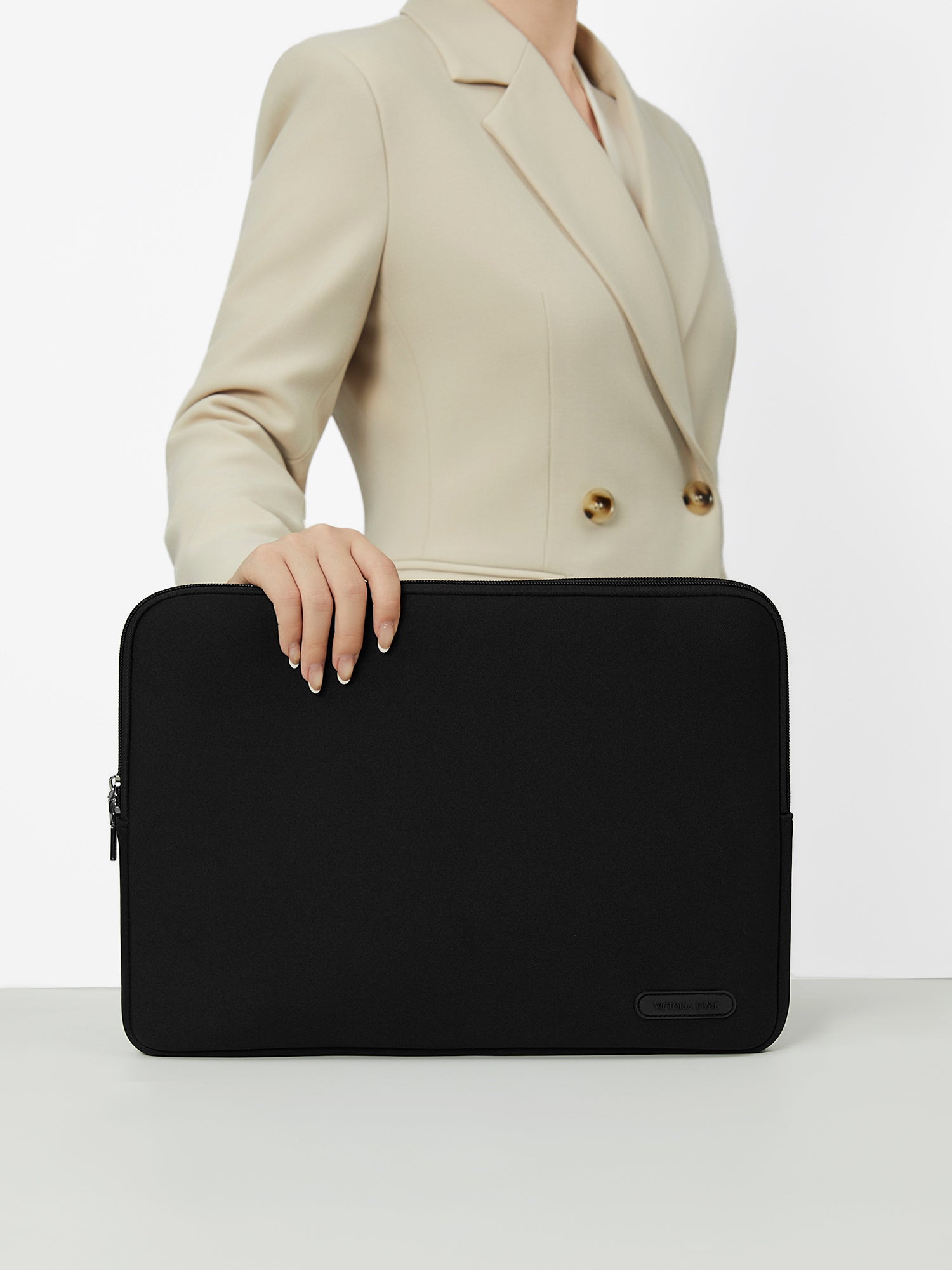 Victoria Hyde black neoprene laptop sleeve, 36x27x1.5cm, fits 15-inch laptop (34.04x23.76cm). Lightweight 0.25kg, durable polyester and zinc alloy hardware.