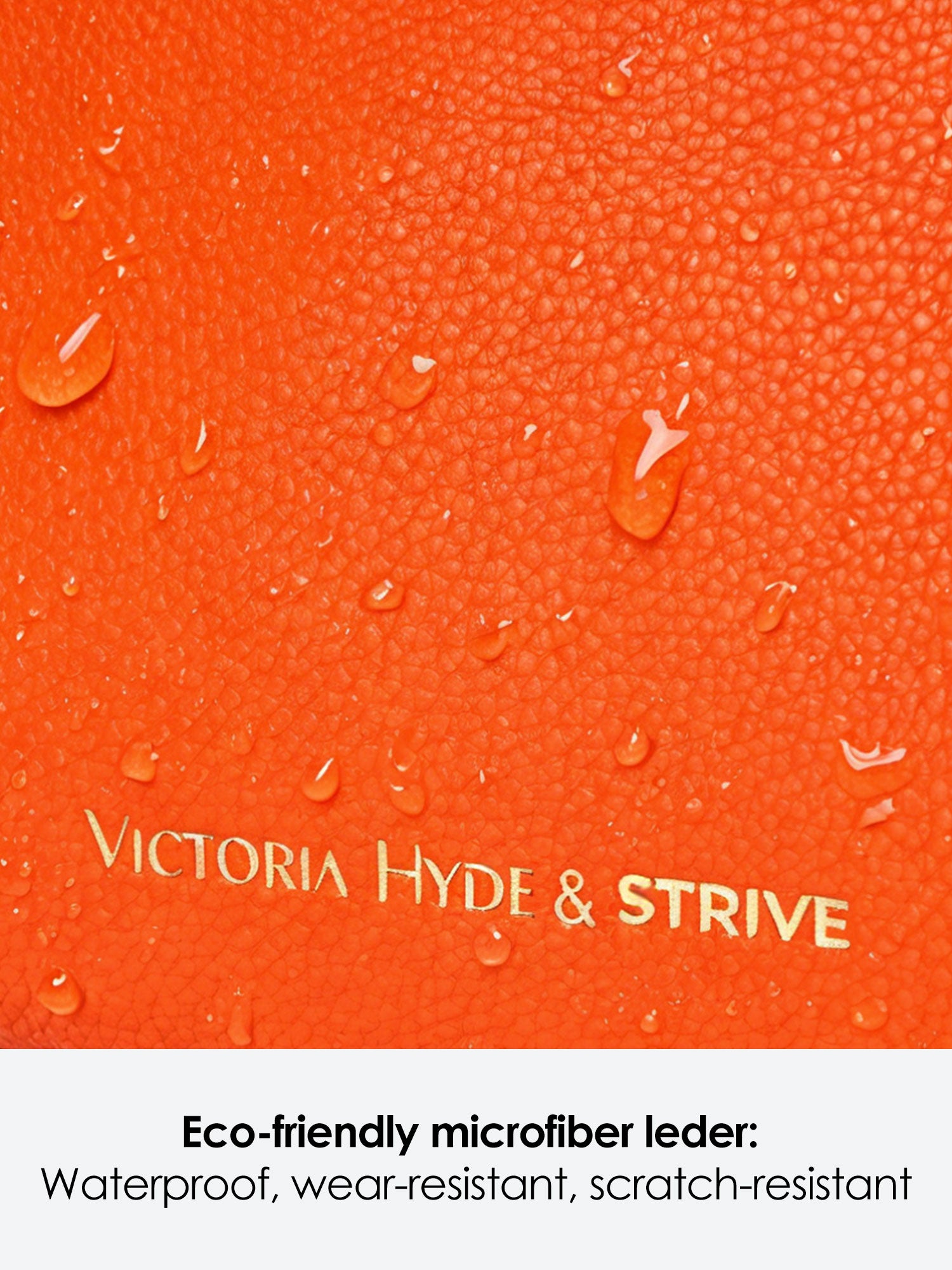 Victoria Hyde Strive Collection orange work bag with thoughtful interior pockets, removable laptop compartment, zippered back with trolley strap, durable microfiber leather, sustainable RPET lining, scratch-resistant &amp; water-repellent. Ideal for professionals.