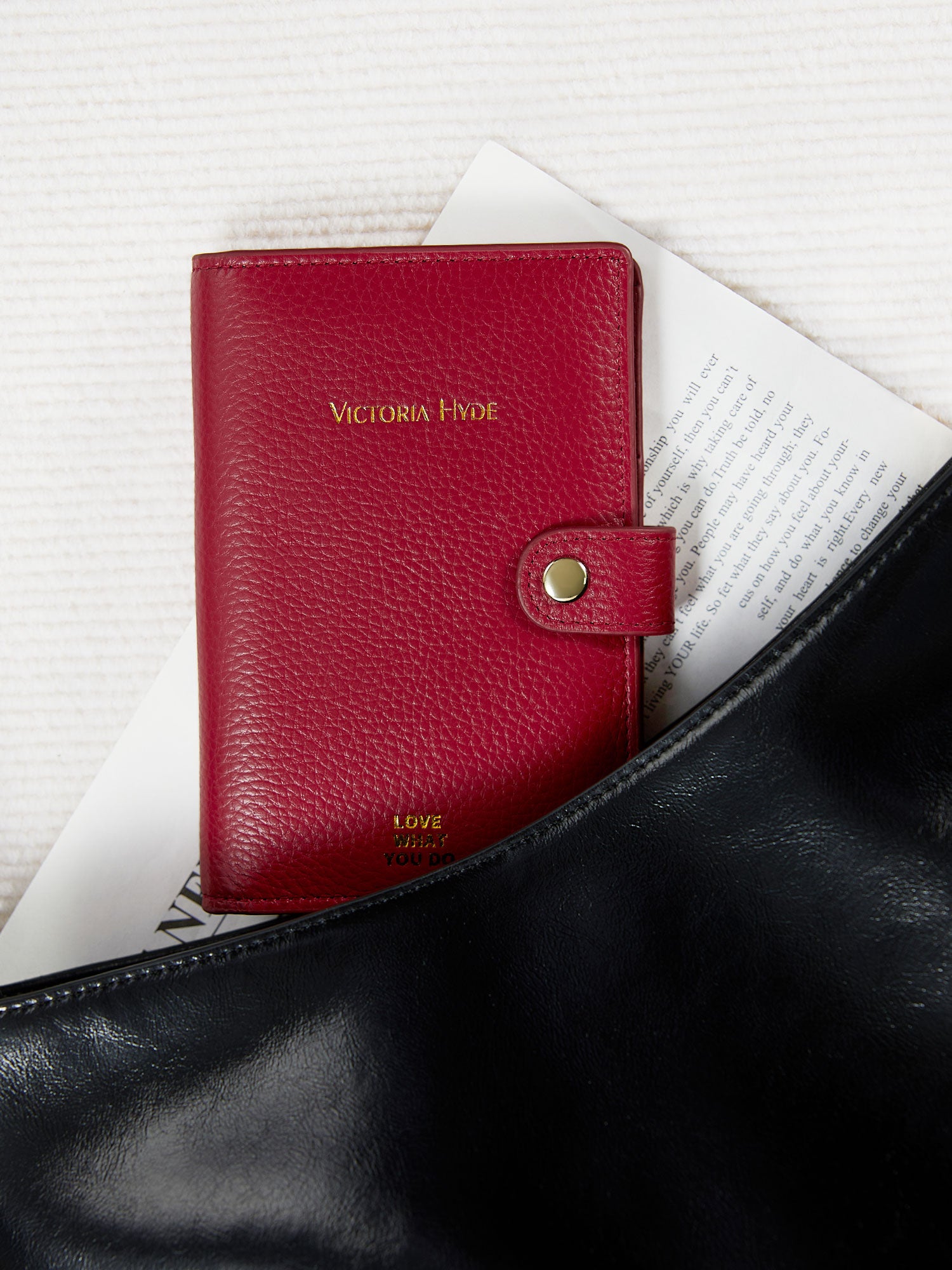Victoria Hyde full-grain leather passport wallet with brass buckle, microfiber lining. Holds passport, boarding pass, 3 cards. Dimensions: 14 x 9.5 cm.