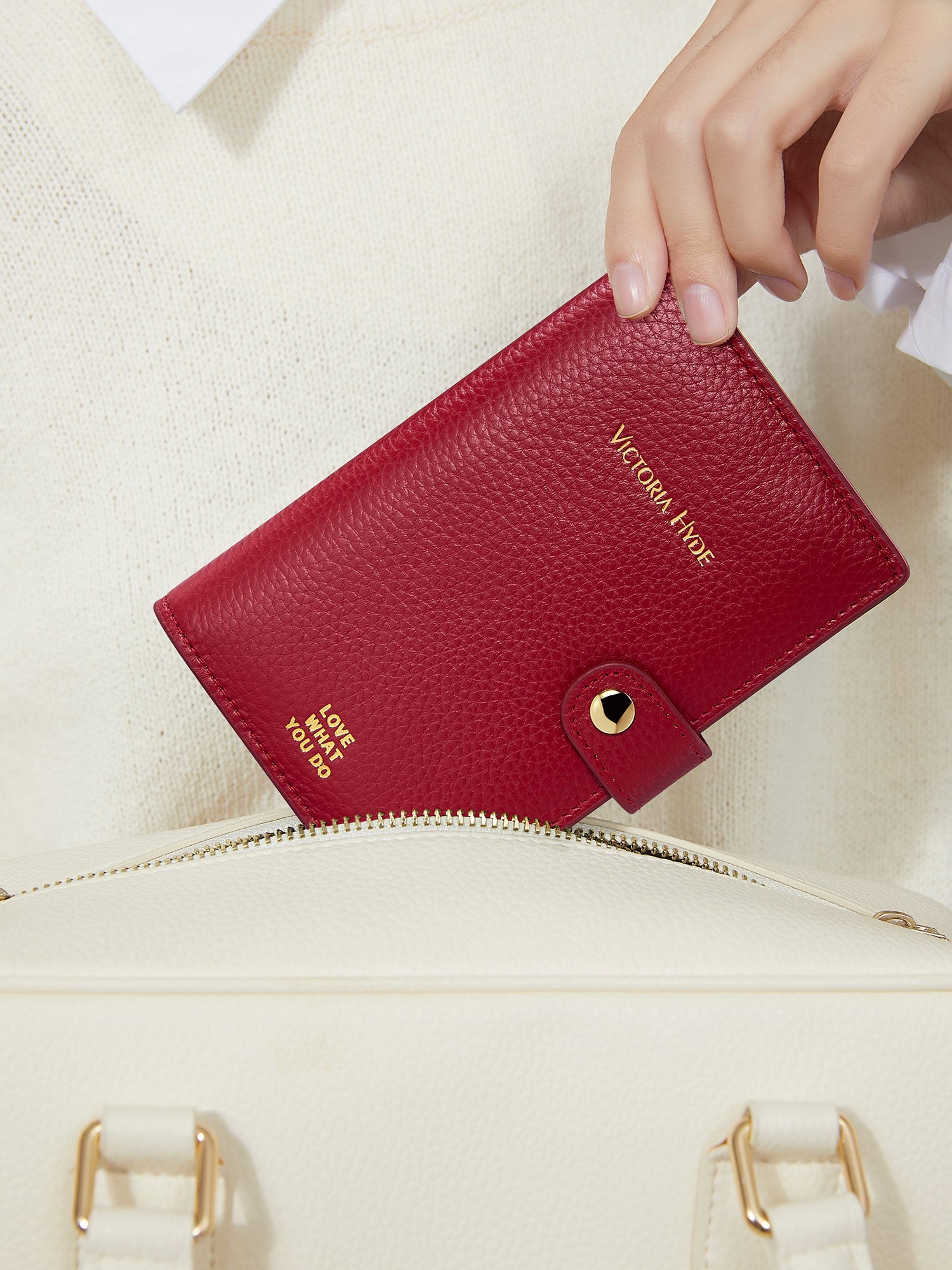 Victoria Hyde full-grain leather passport wallet with brass buckle, microfiber lining. Holds passport, boarding pass, 3 cards. Dimensions: 14 x 9.5 cm.