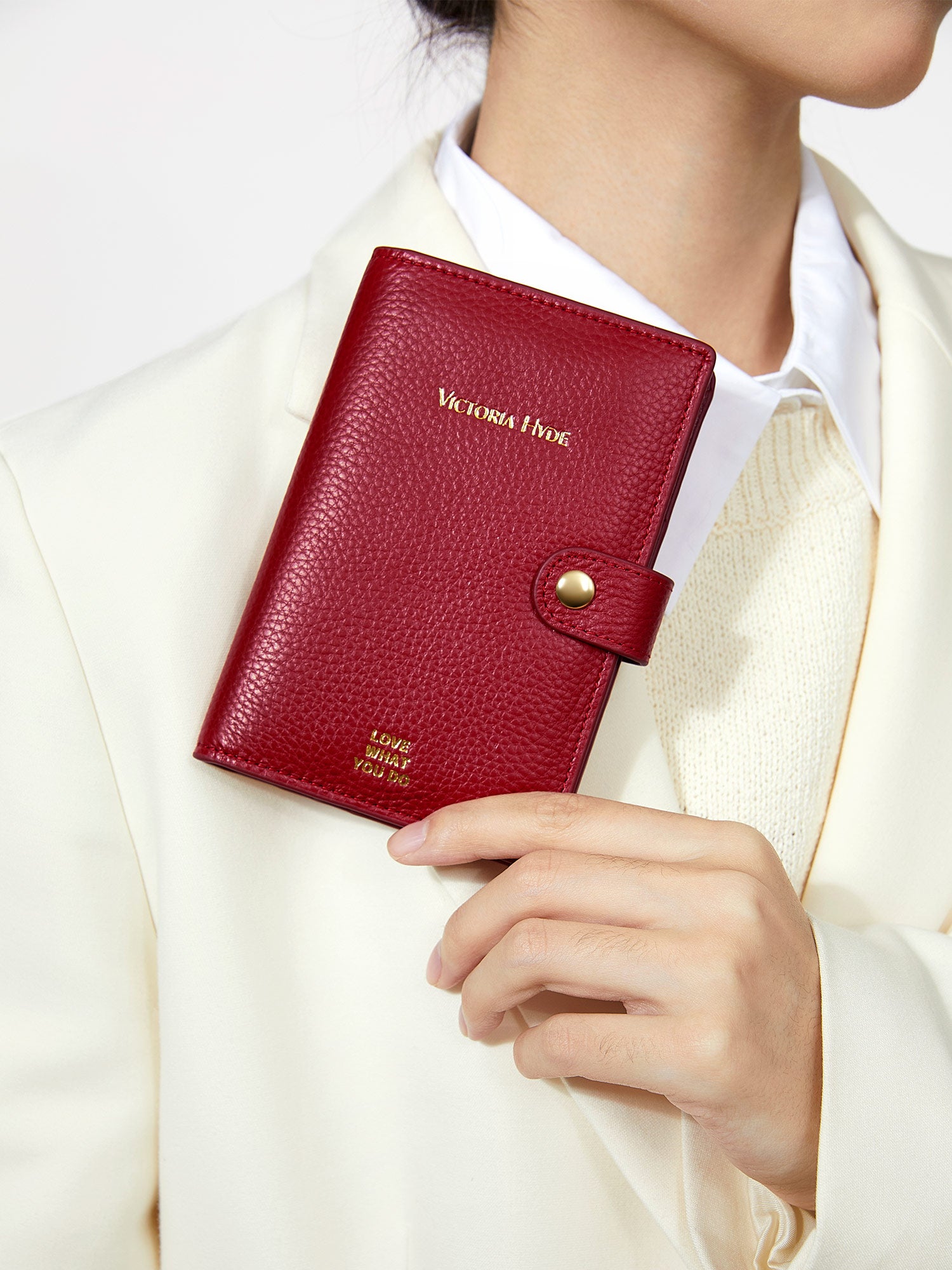 Victoria Hyde full-grain leather passport wallet with brass buckle, microfiber lining. Holds passport, boarding pass, 3 cards. Dimensions: 14 x 9.5 cm.
