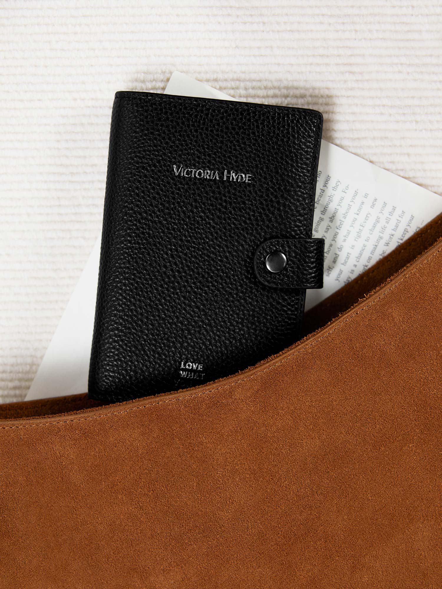 Victoria Hyde full-grain leather wallet with brass buckle, passport slot, boarding pass pocket, 3 card slots. 14 x 9.5 x 1 cm.