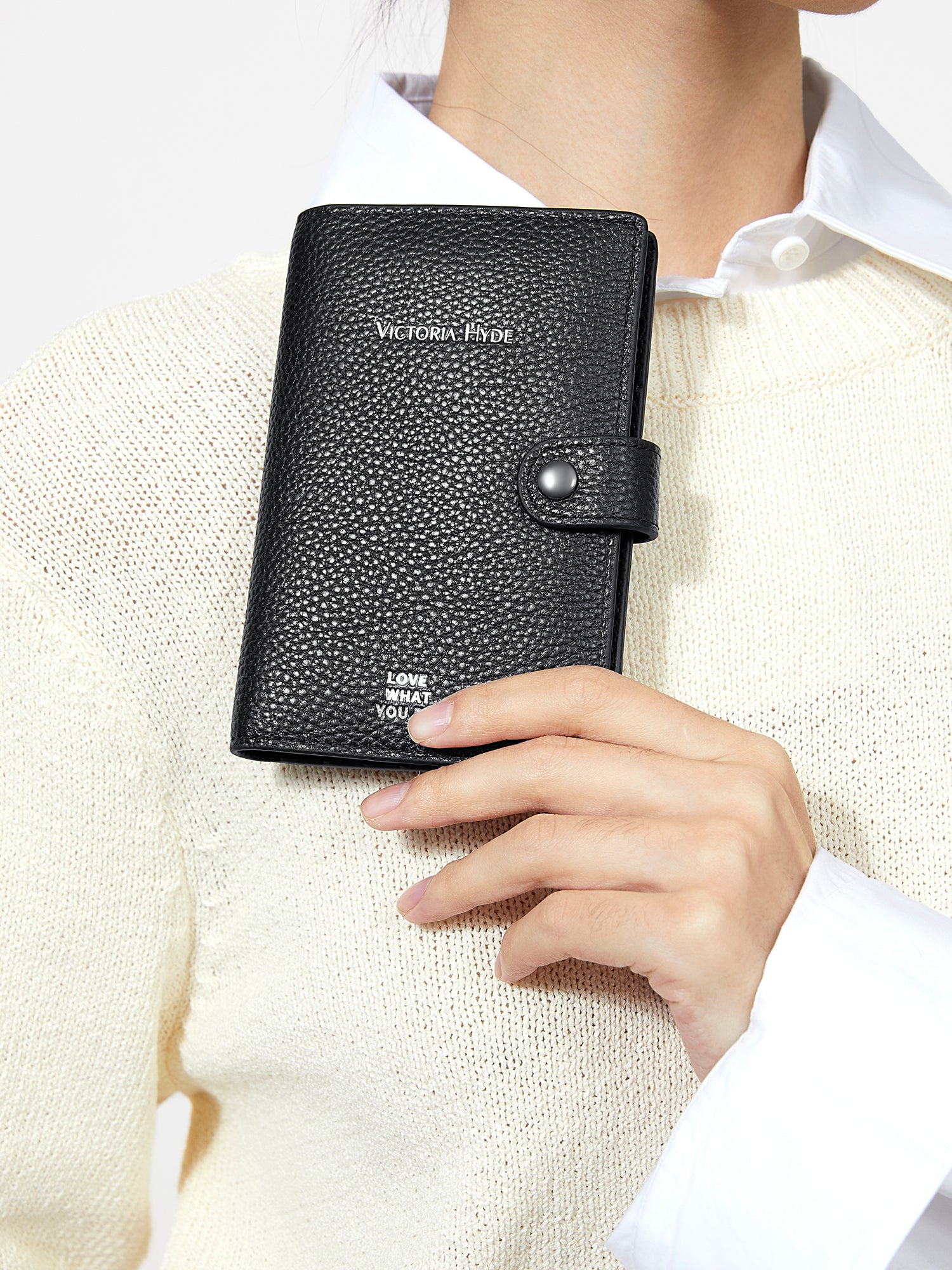 Victoria Hyde full-grain leather wallet with brass buckle, passport slot, boarding pass pocket, 3 card slots. 14 x 9.5 x 1 cm.
