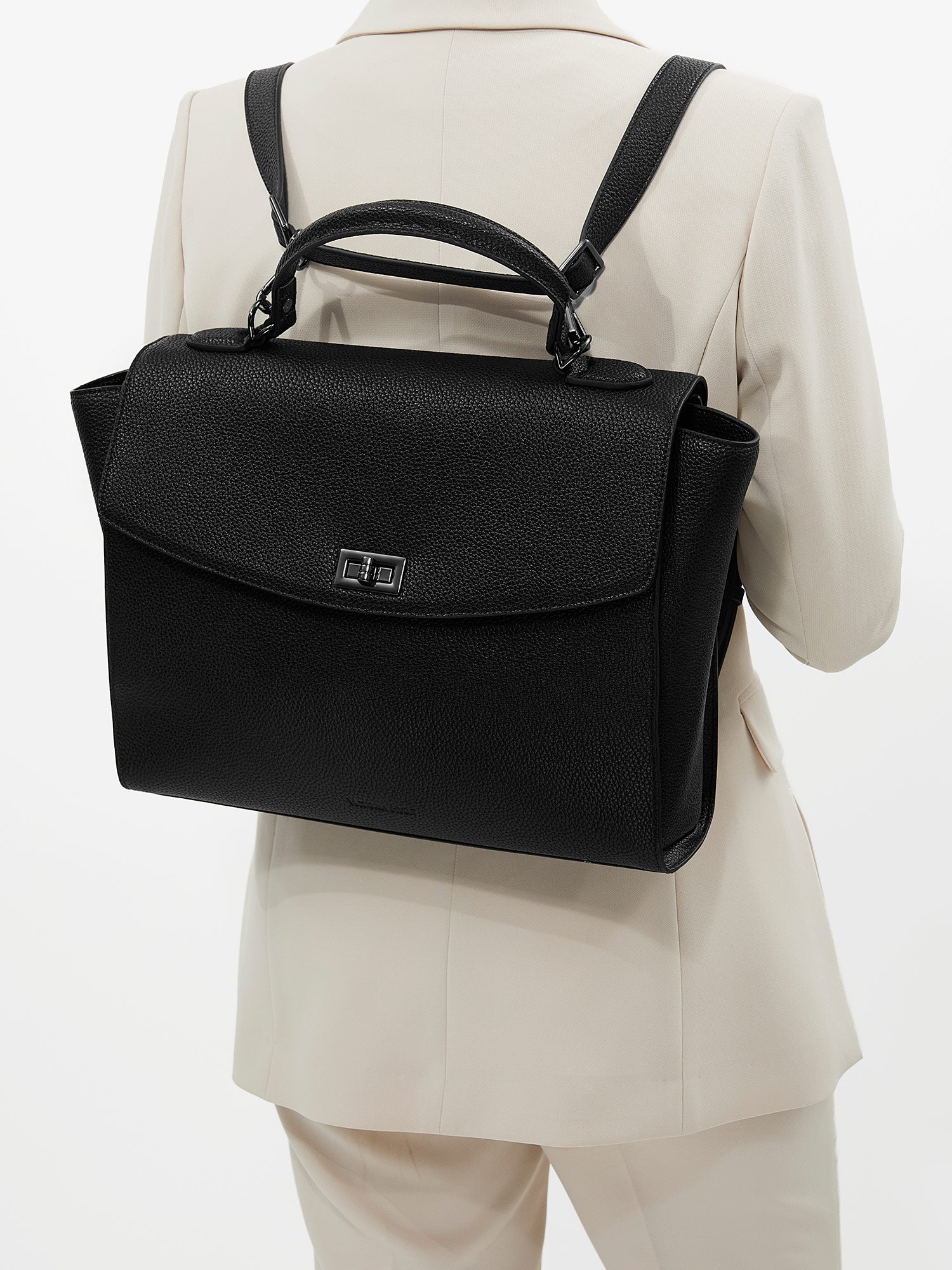 Victoria Hyde 2-in-1 convertible backpack – stylish microfibre leather handbag transforms to comfortable backpack. Removable straps, padded 13" laptop compartment, organised interior. Lightweight 880g.