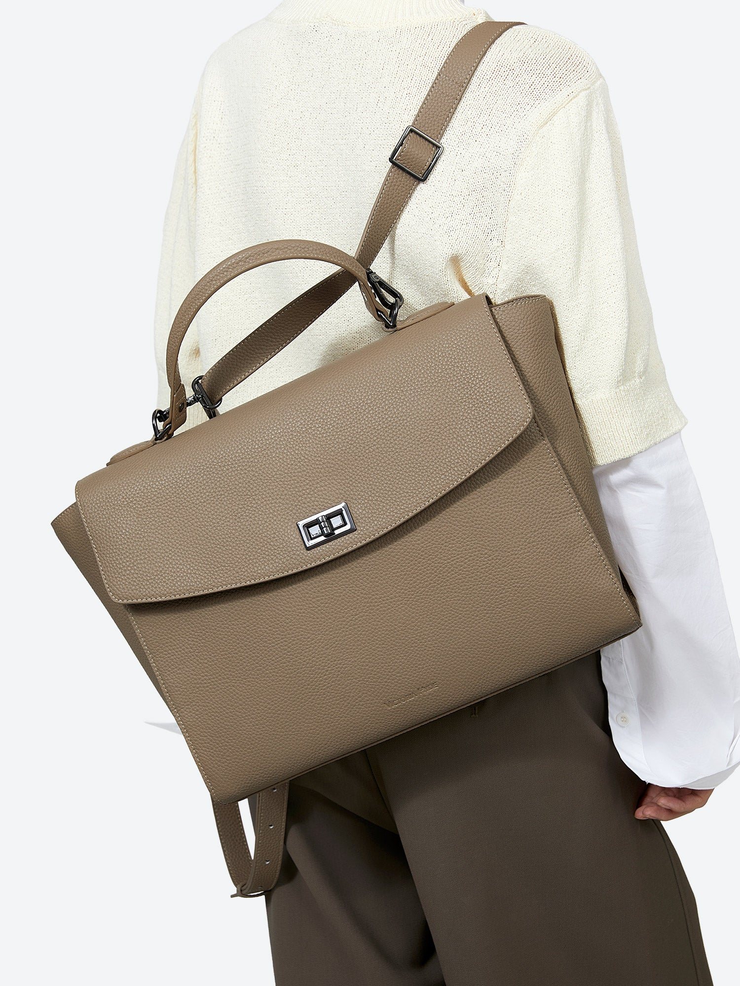 Victoria Hyde 2-in-1 backpack: stylish microfiber leather, converts from handbag to backpack with detachable straps, padded tablet compartment, lightweight.