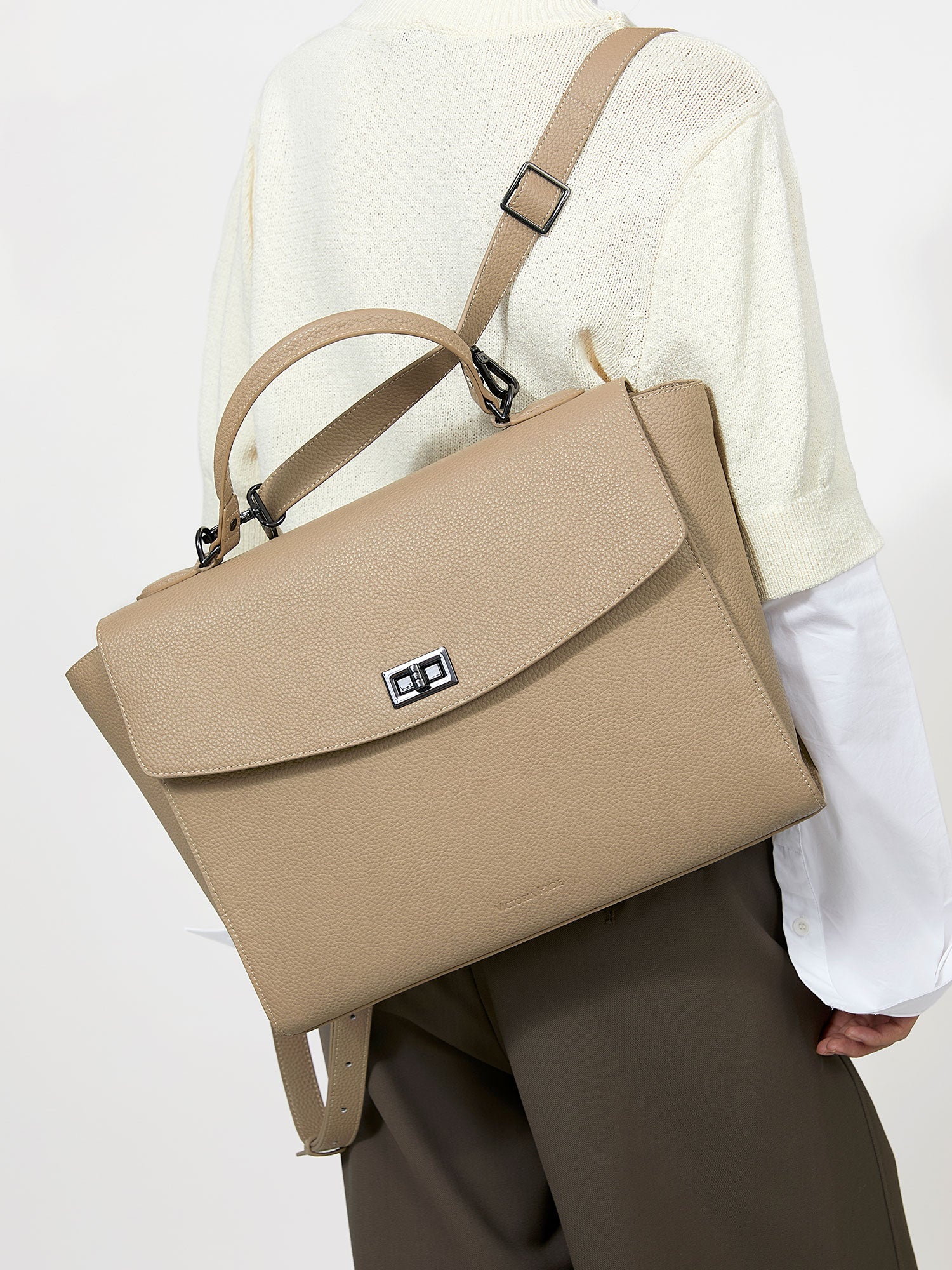 Victoria Hyde 2-in-1 backpack: stylish microfiber leather, converts from handbag to backpack with detachable straps, padded tablet compartment, lightweight.