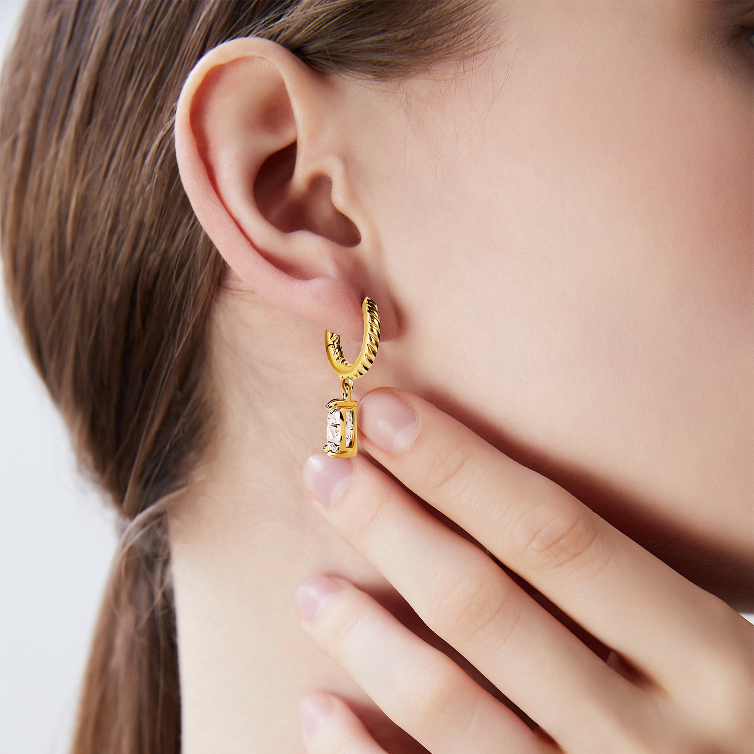 Victoria Hyde gold hoop earrings with pendant for women. Timeless elegance, brilliant-like stone, clip closure, comfortable secure fit. Glamorous accent for classic or modern looks.