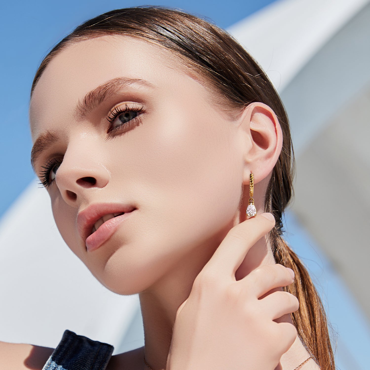 Victoria Hyde gold hoop earrings with pendant for women. Timeless elegance, brilliant-like stone, clip closure, comfortable secure fit. Glamorous accent for classic or modern looks.