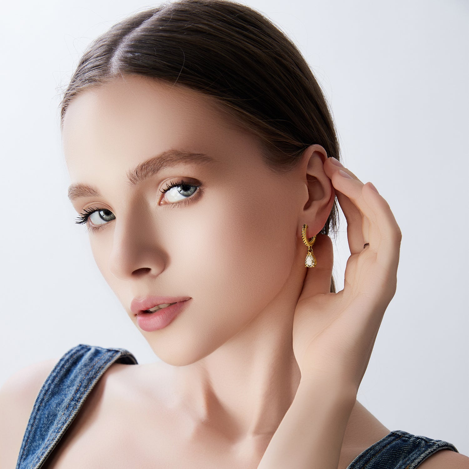Victoria Hyde gold hoop earrings with pendant for women. Timeless elegance, brilliant-like stone, clip closure, comfortable secure fit. Glamorous accent for classic or modern looks.