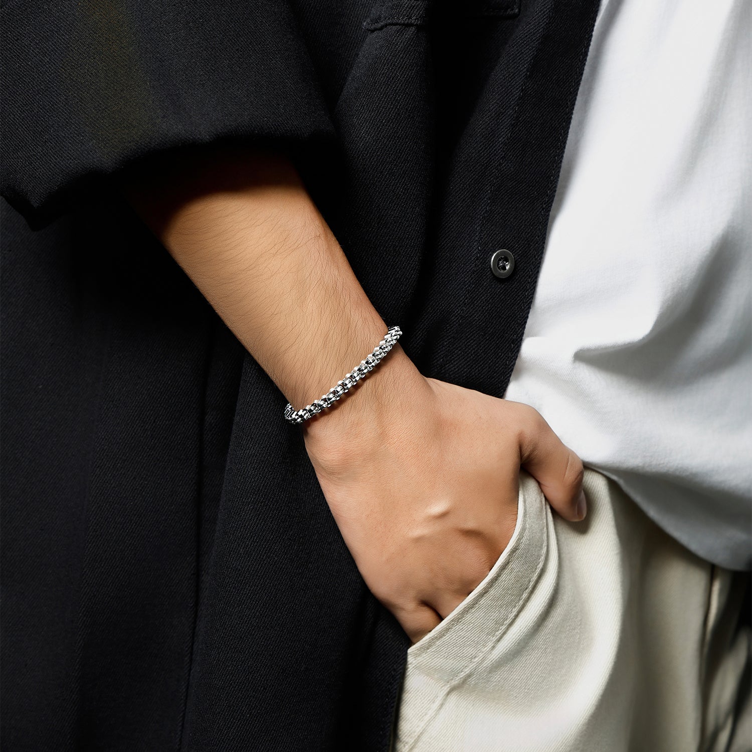 Minimalist Victoria Hyde silver bracelet for men. Timeless, lightweight elegance for casual or formal wear. Perfect understated accessory.