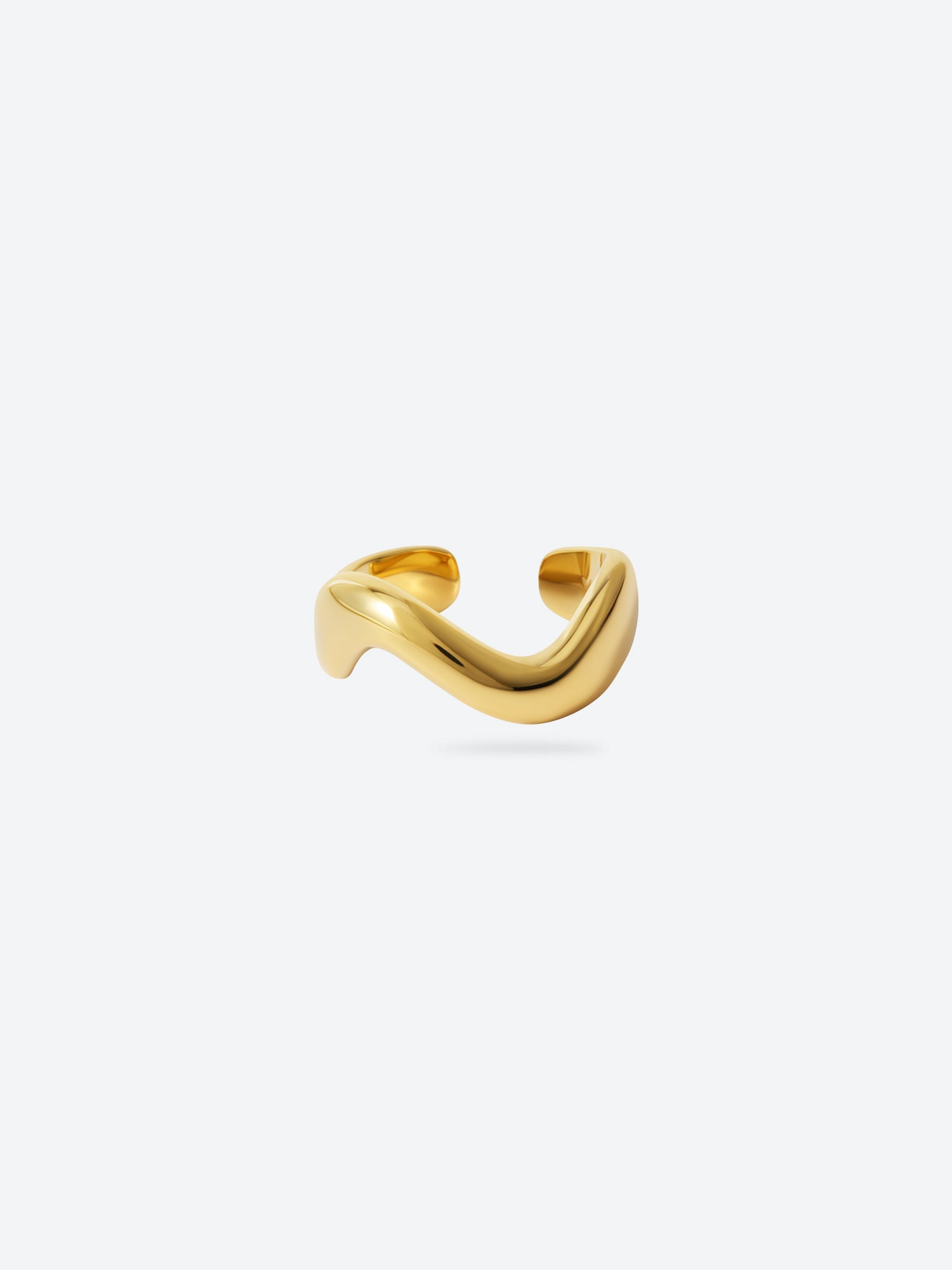 Victoria Hyde Ursula ring in 1N14 light gold, featuring an organic asymmetric design with variable width and a comfortable solid build made from eco-friendly copper for modern everyday styling