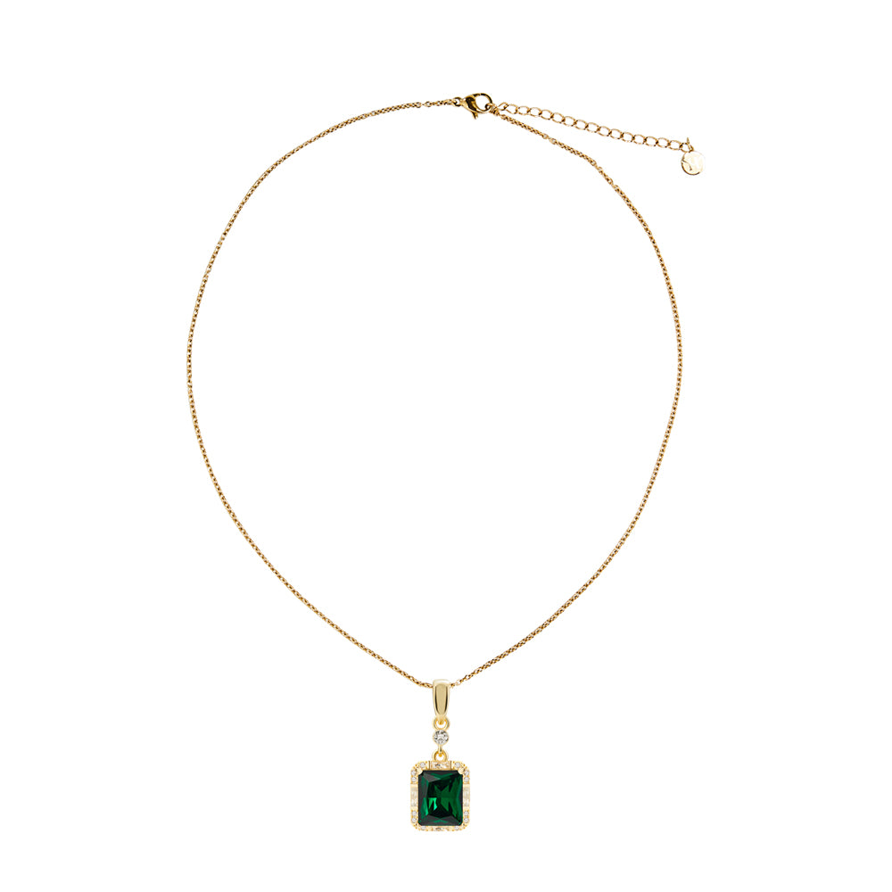 Victoria Hyde London jewelry set with light gold necklace and earrings, featuring deep green rectangular stones. Elegant, glamorous design for daily or special occasions.