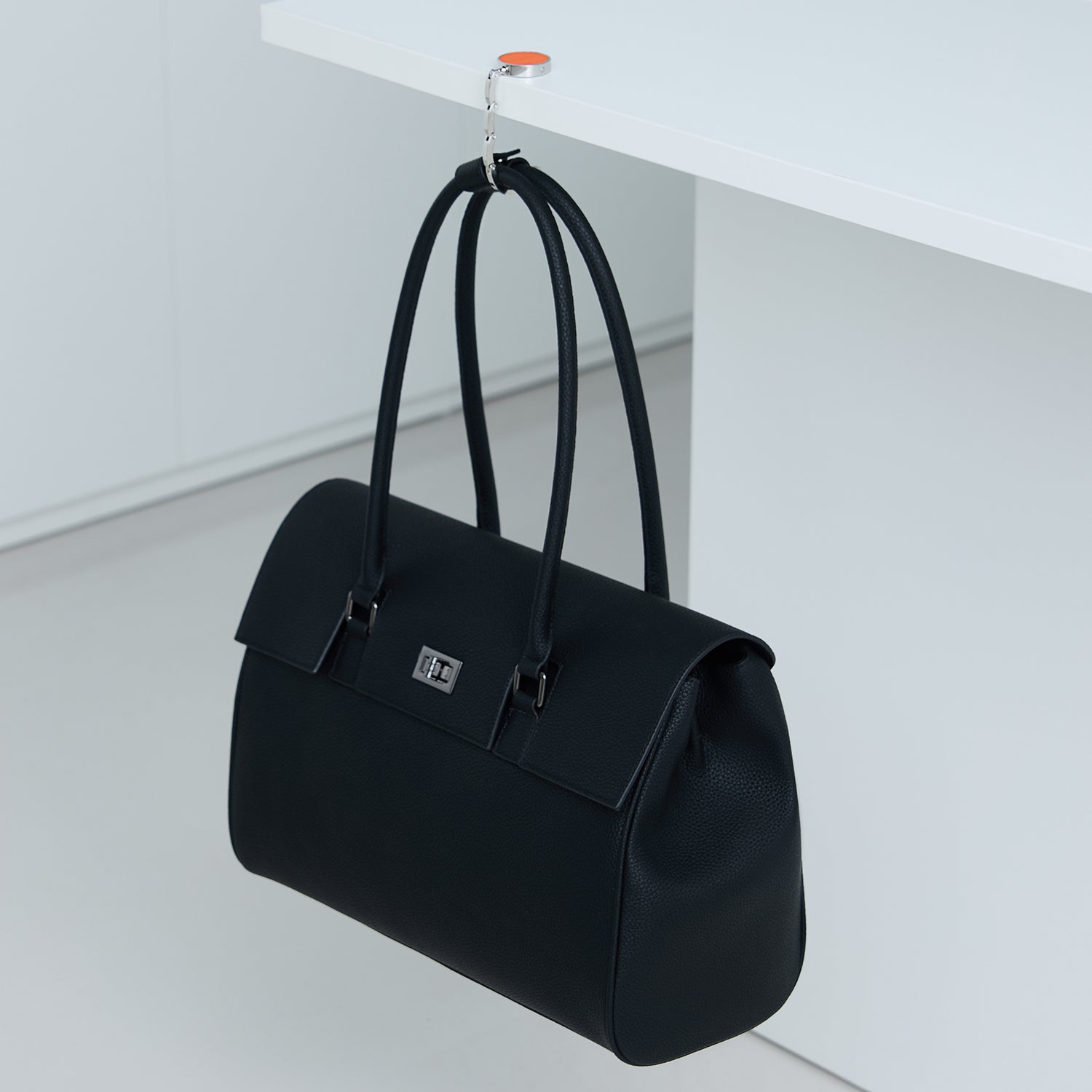 Victoria Hyde London Abigail anti-slip bag hook – compact microfiber &amp; steel design with silicone grip. Lightweight, scratch-free, perfect for desks or restaurants.