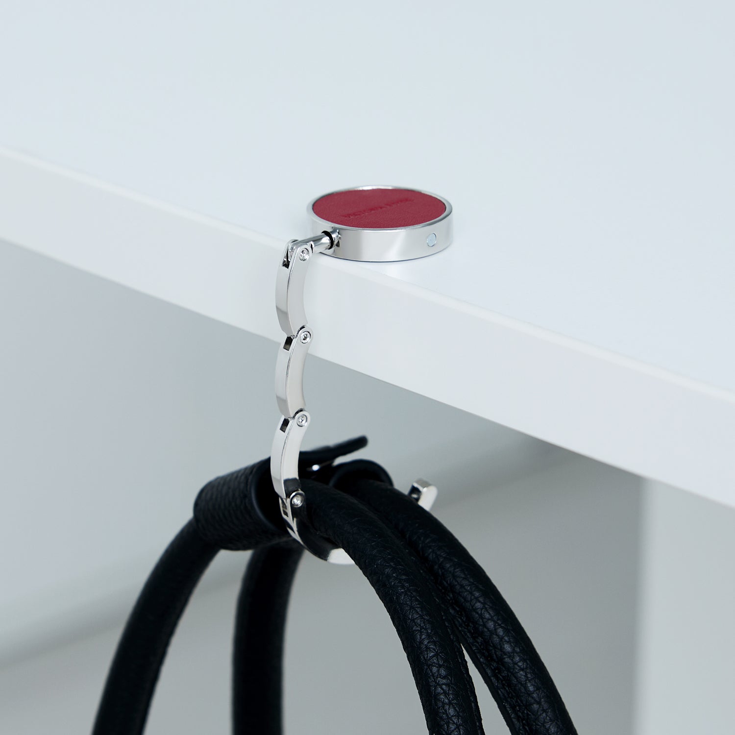Victoria Hyde London anti-slip purse hook "Abigail" – compact, lightweight (32.9g), silicone grip, steel construction, protects tables, perfect for bags in offices or cafes.