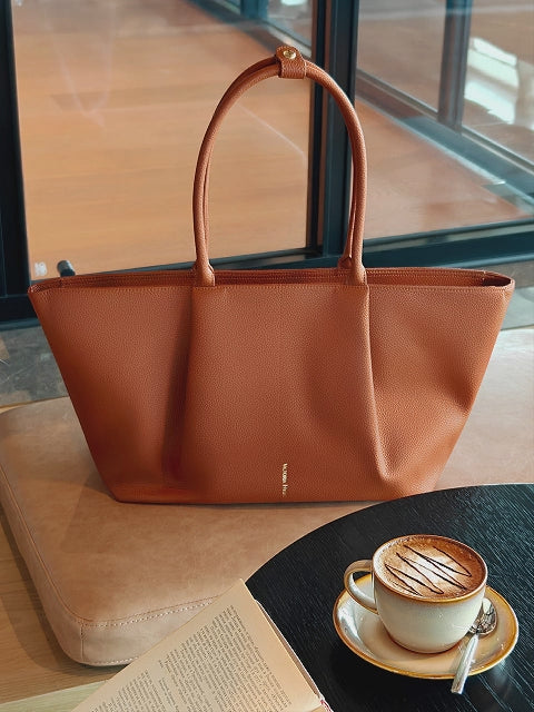 Victoria Hyde Ada laptop handbag in brown, stylish vegan leather business bag for women, featuring a padded compartment for up to 16-inch laptops.