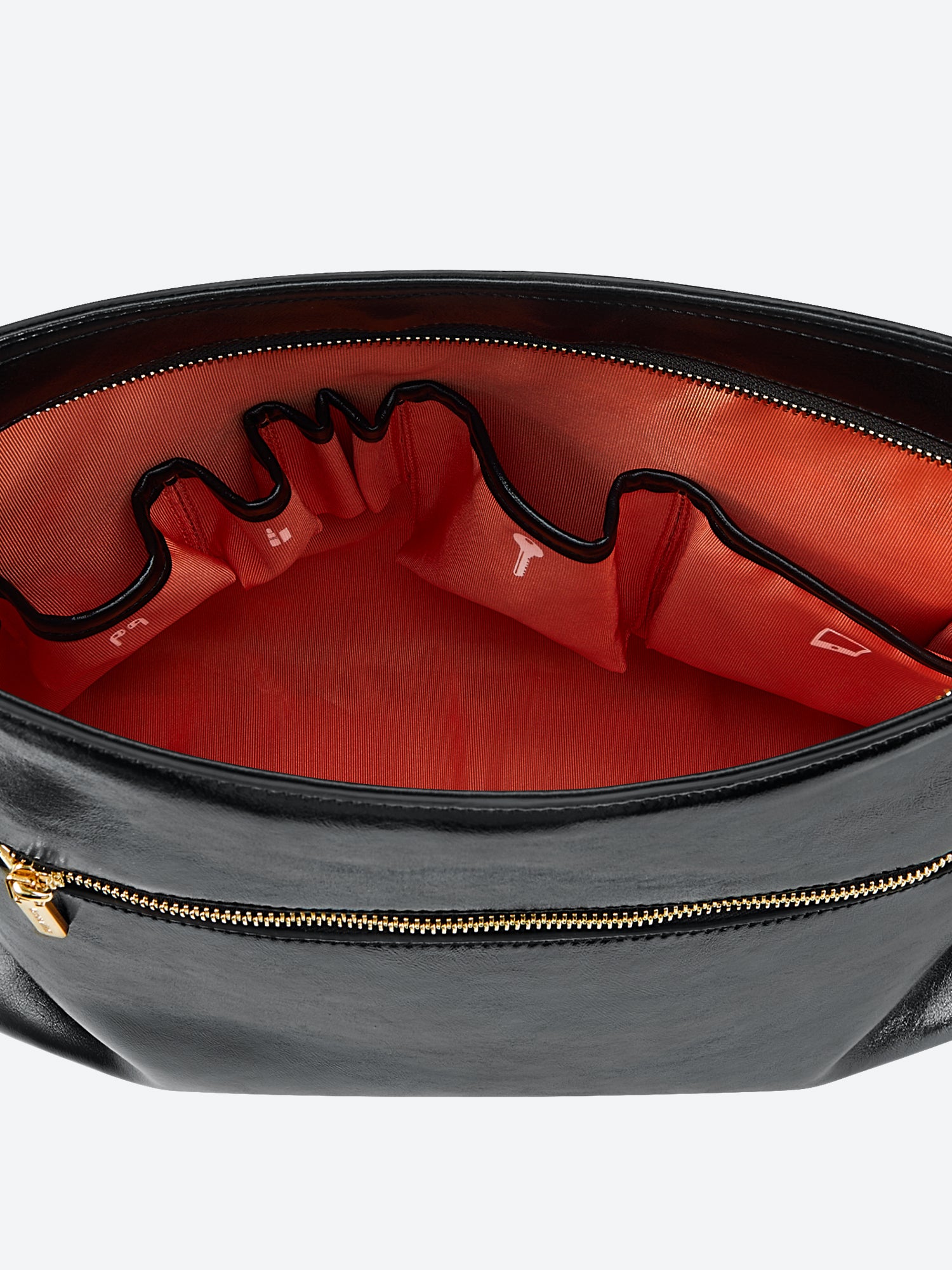 Victoria Hyde shoulder bag, microfiber leather, recycled lining. Padded sunglasses compartment, trolley strap, light gold hardware. “Love what you do” detail.