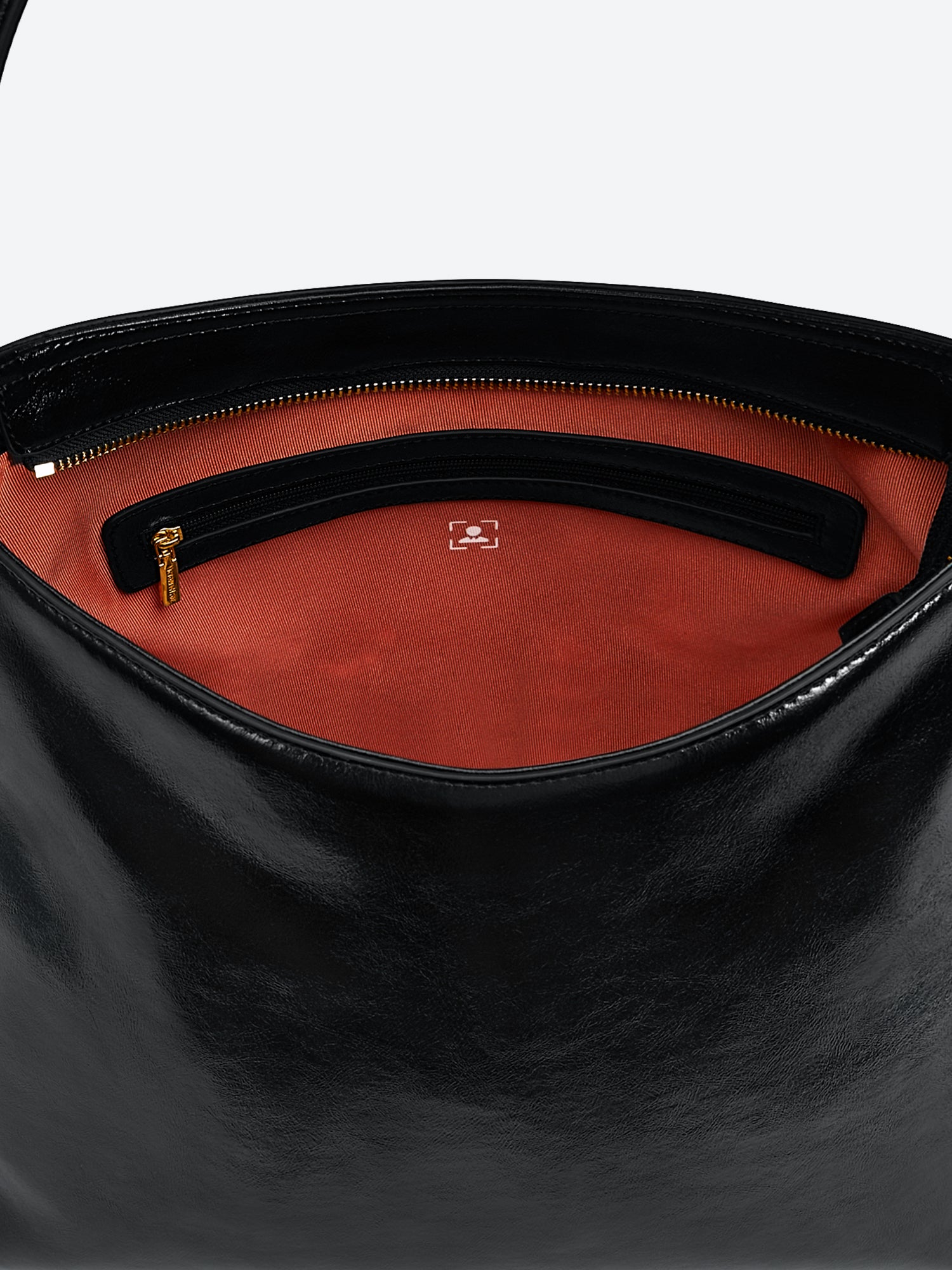 Victoria Hyde shoulder bag, microfiber leather, recycled lining. Padded sunglasses compartment, trolley strap, light gold hardware. “Love what you do” detail.