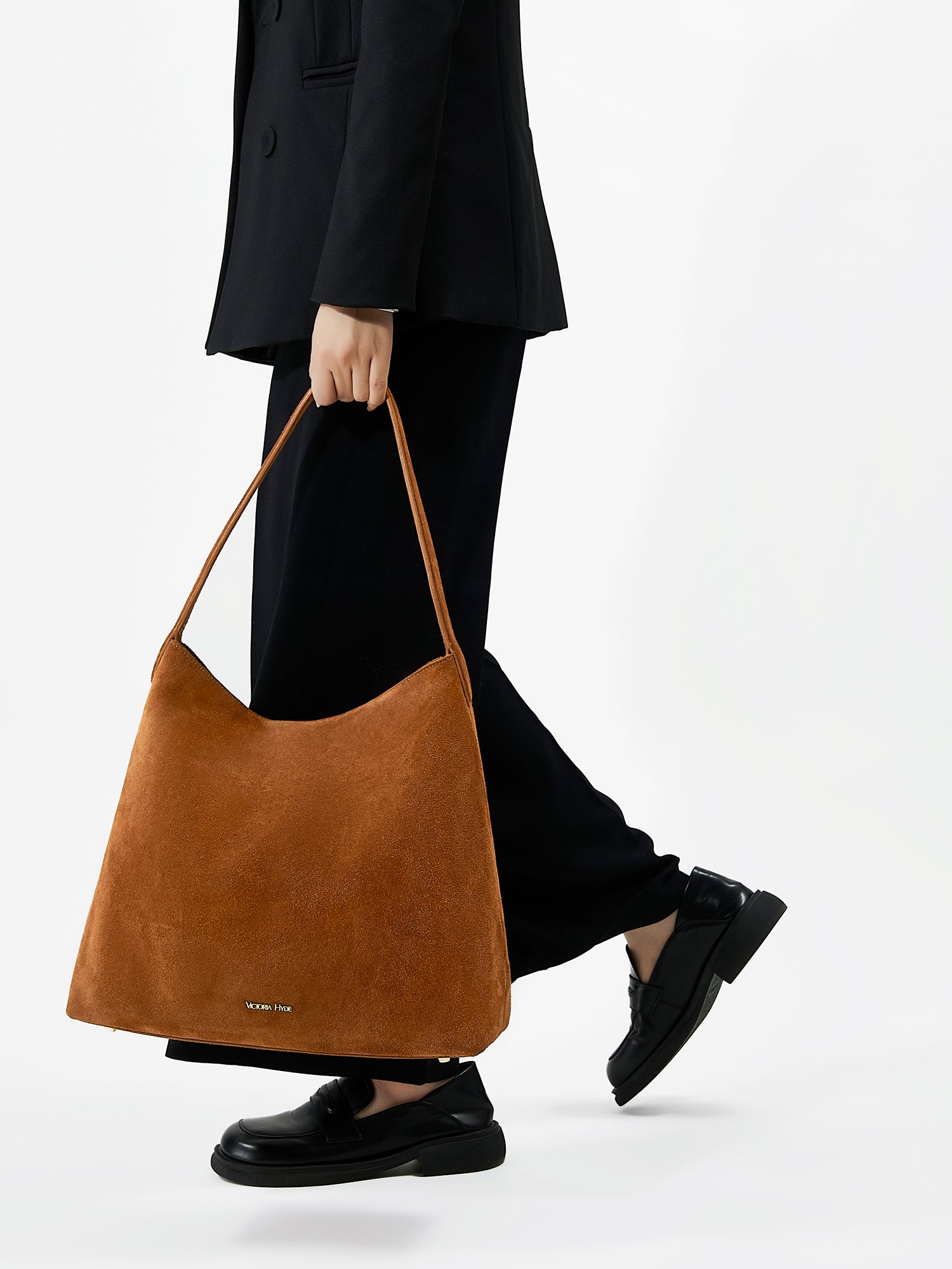 Victoria Hyde shoulder bag, split leather with recycled lining, multifunctional interior for phone, sunglasses, lipstick, keys, plus trolley strap and external zip pocket.
