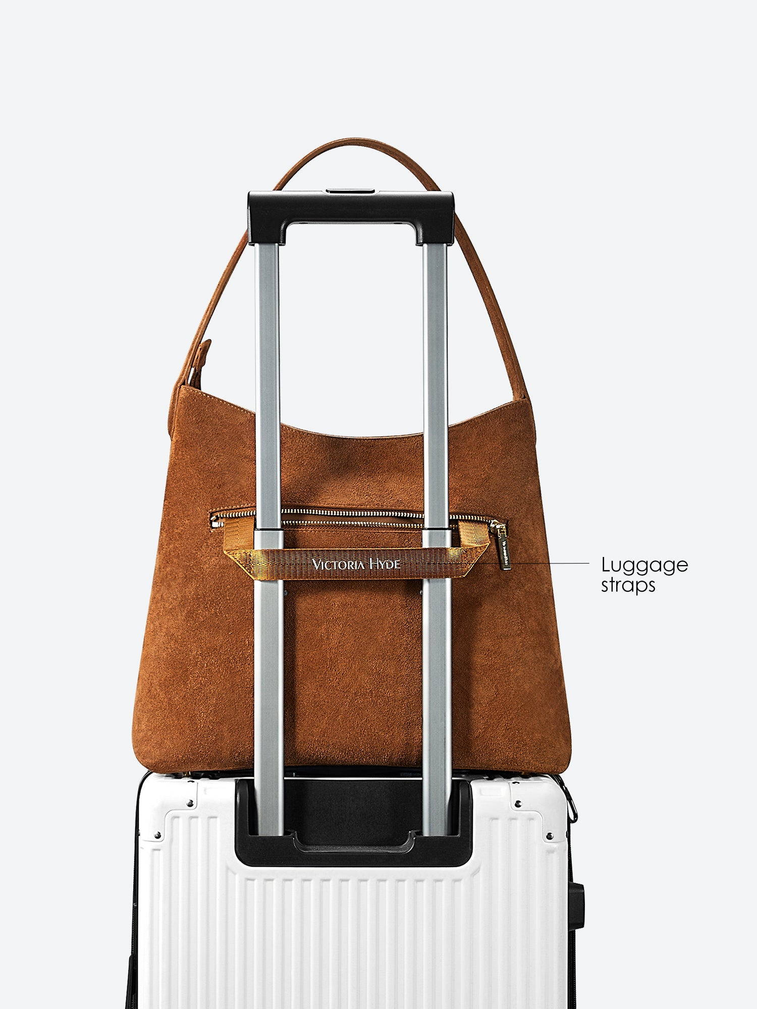 Victoria Hyde shoulder bag, split leather with recycled lining, multifunctional interior for phone, sunglasses, lipstick, keys, plus trolley strap and external zip pocket.
