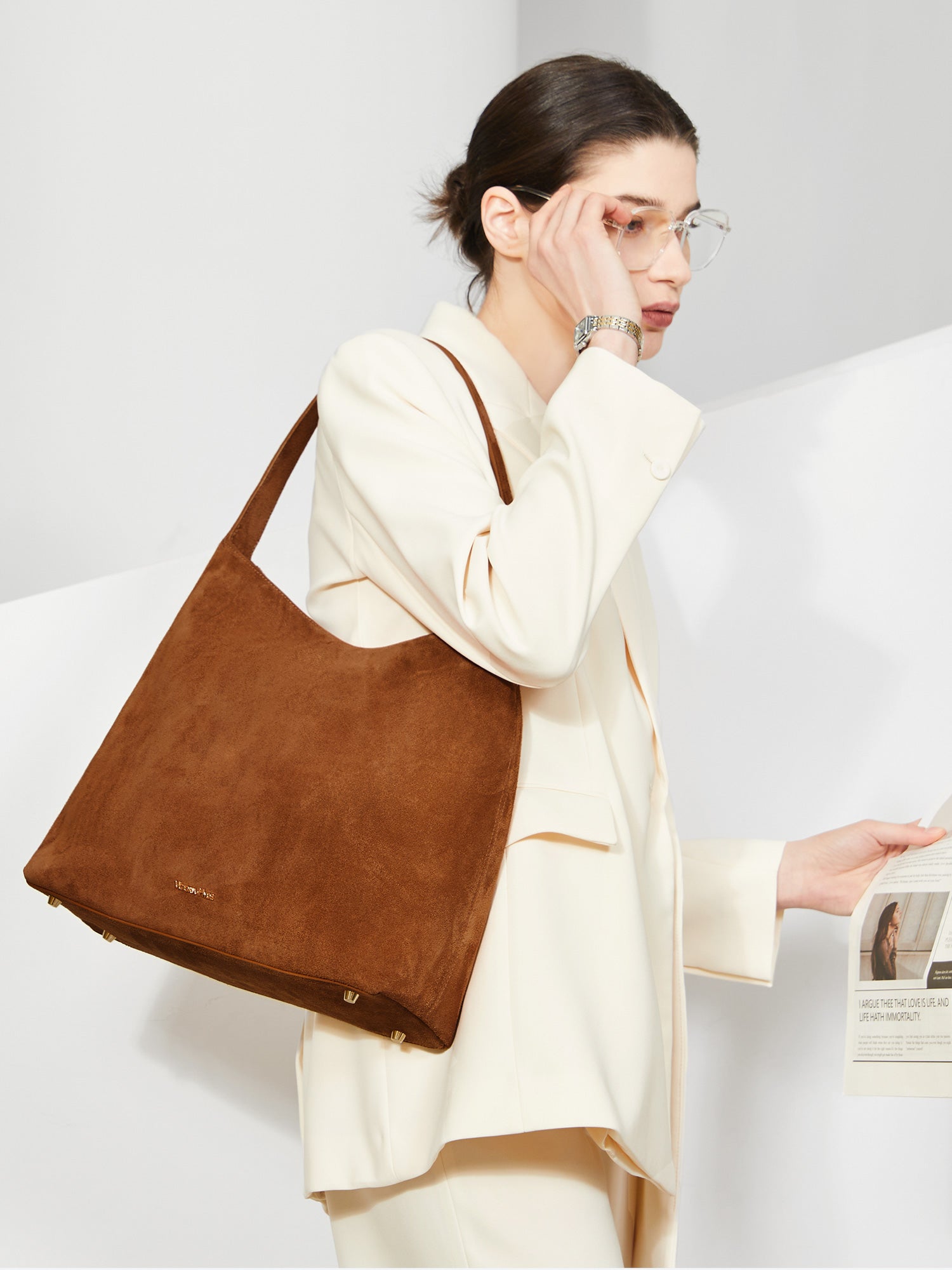 Victoria Hyde shoulder bag, split leather with recycled lining, multifunctional interior for phone, sunglasses, lipstick, keys, plus trolley strap and external zip pocket.