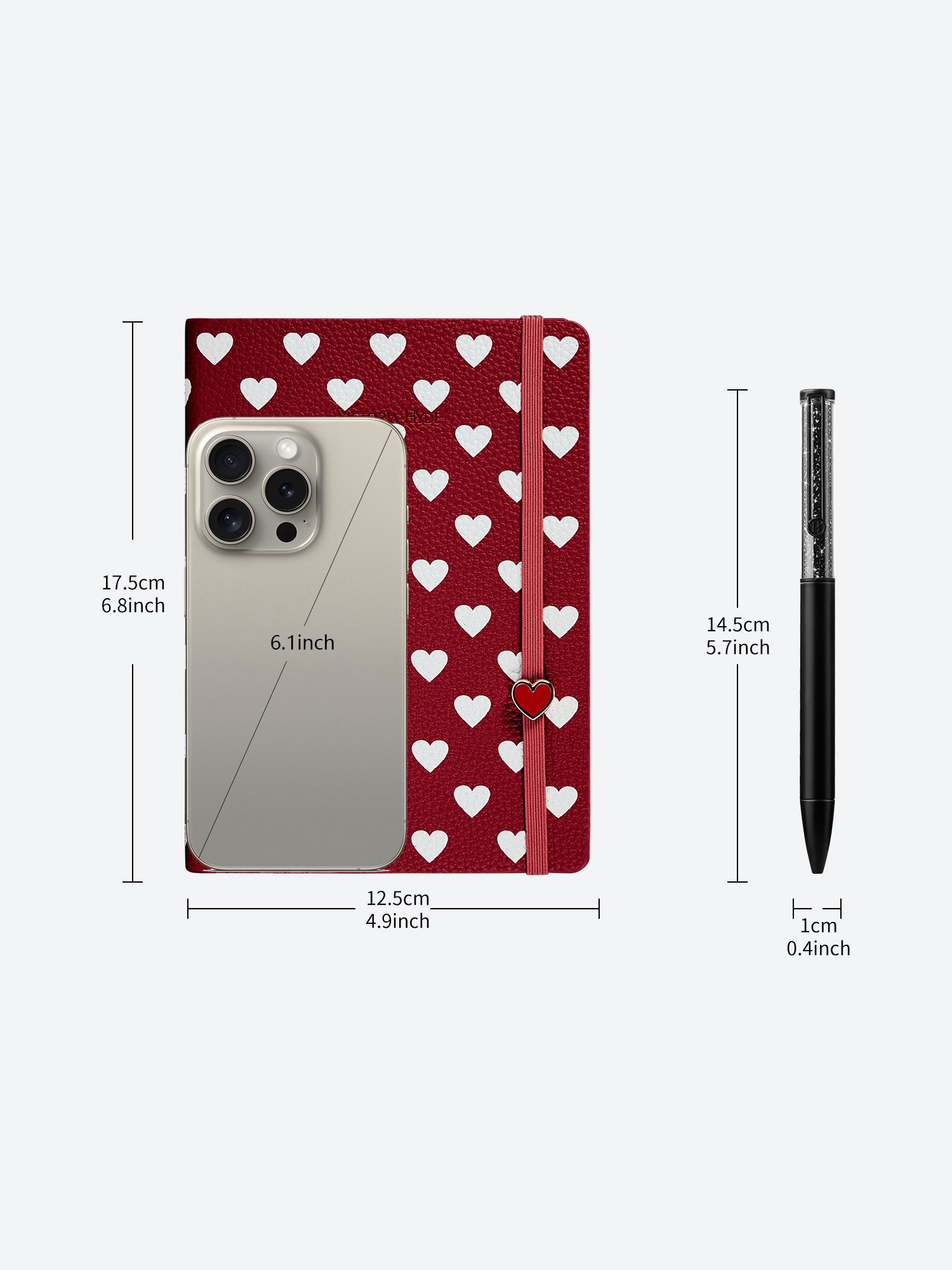 Size dimensions of Victoria Hyde Anna notebook in red and matching black crystal pen, showing measurements in centimeters and inches for reference.