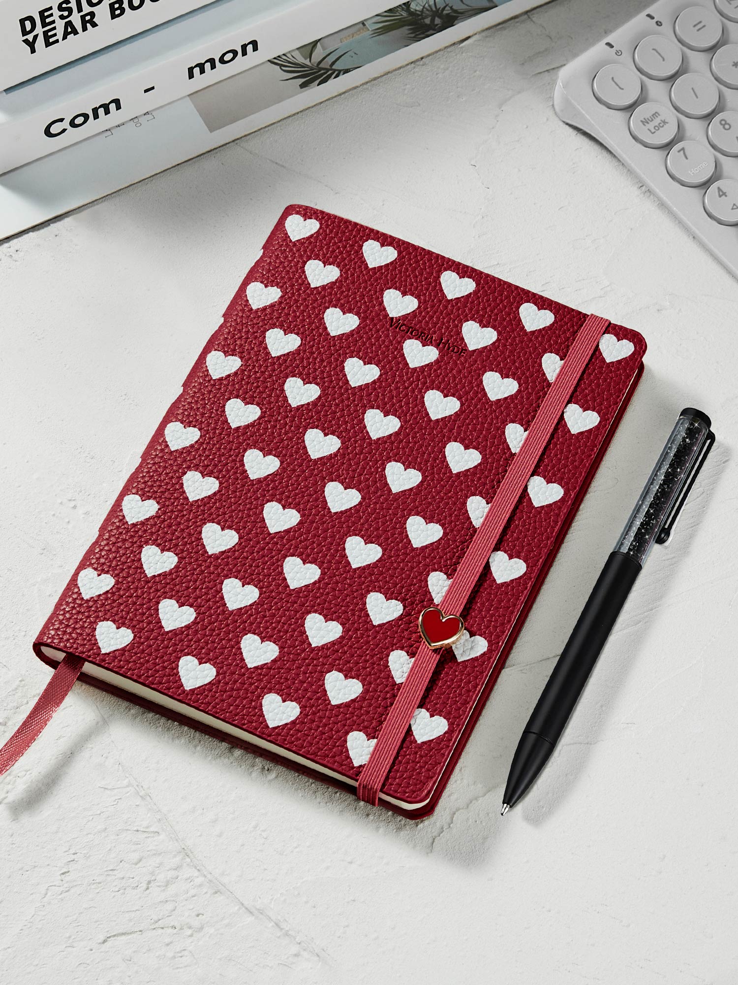 Victoria Hyde Anna Notebook in red with heart pattern and elegant black crystal pen, a perfect stationery gift set for office and journaling.