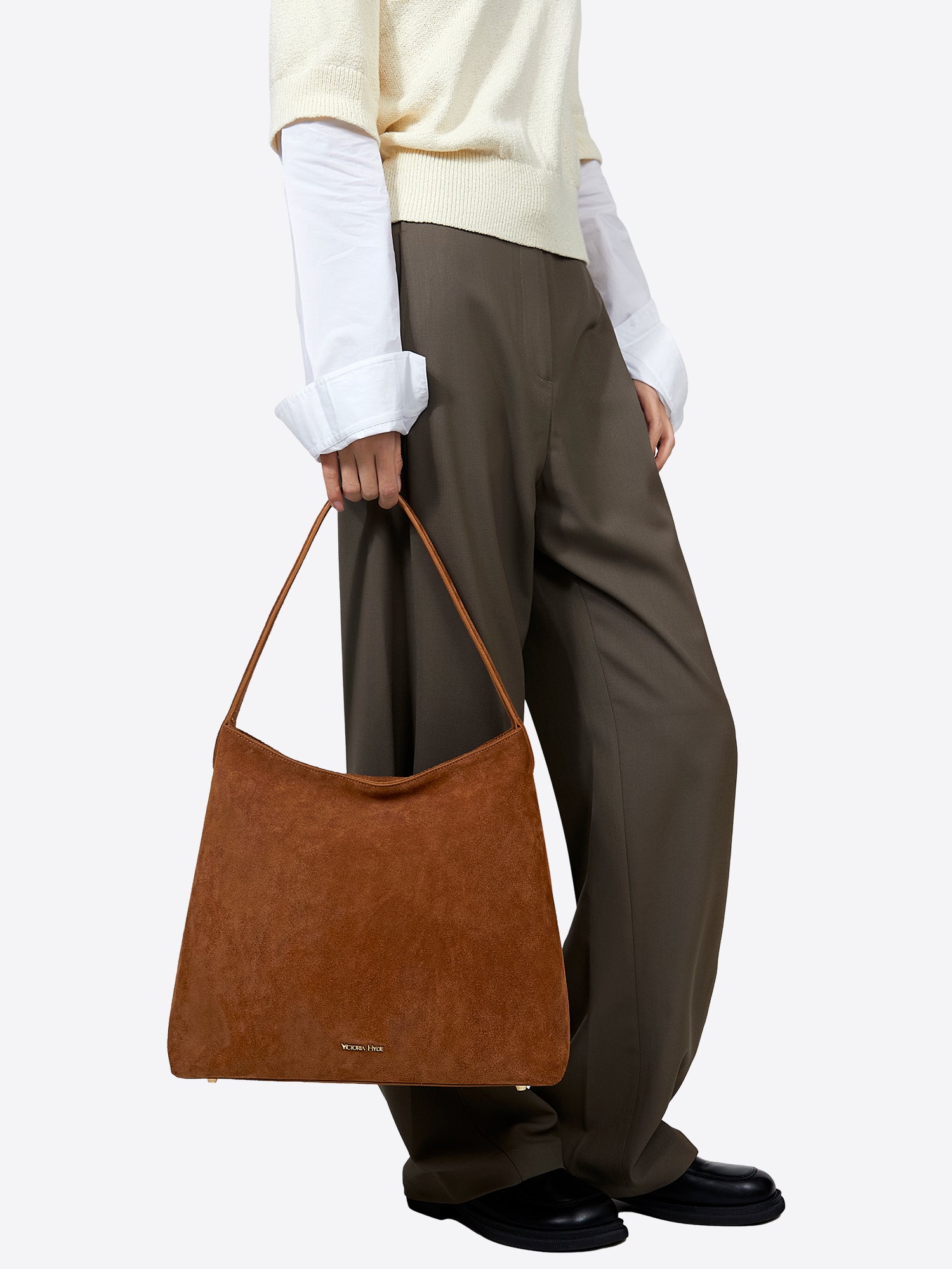 Elegant women's shoulder bag in Split Leather with light gold hardware, perfect for work and daily use