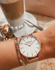 rosegoldene Armbanduhr mit passenden Armband